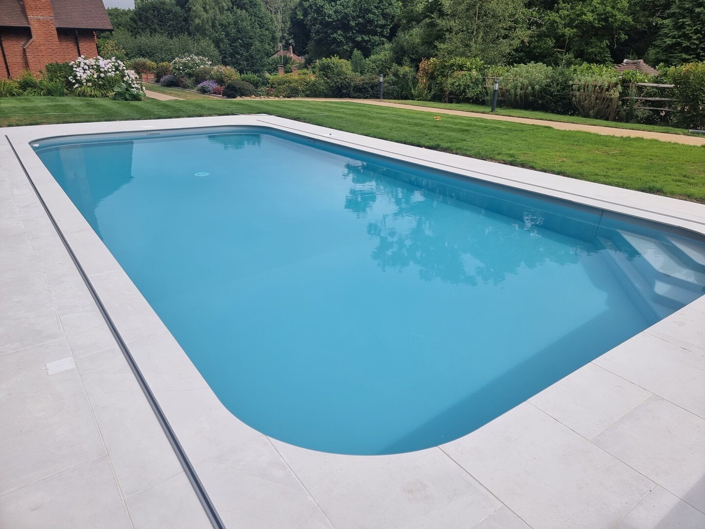 Swimming pool installation &amp; coping surround completed by #NautilusPools. Large format Comblanchien Porcelain paving from #LondonStone.

Measure twice, cut once - I actually measured 3 or 4 times to ensure the specification was accurate to the mm