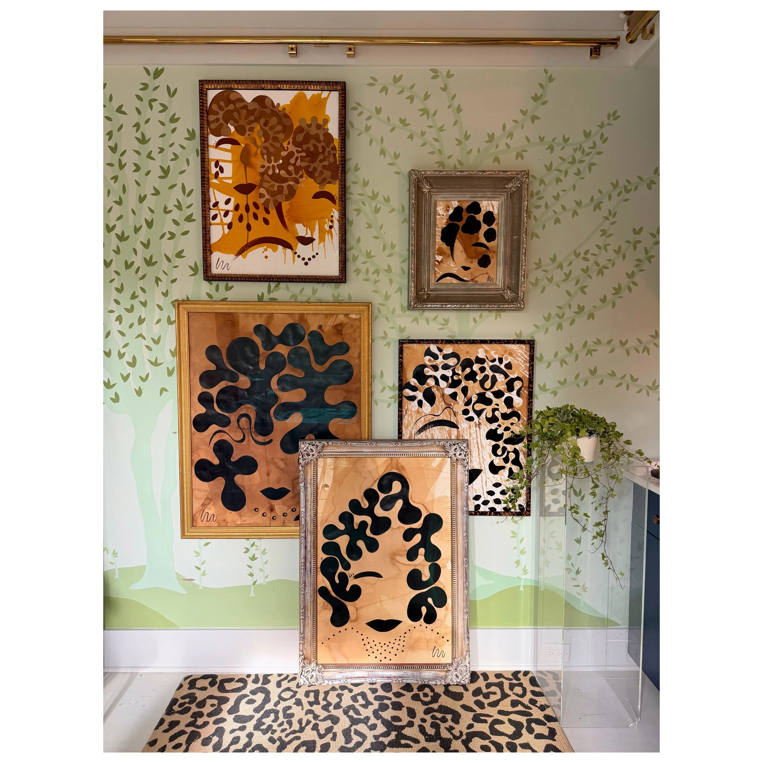 FramedPiecesInStudioWithBorder.JPG