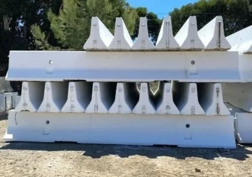 Stacks of concrete barriers for protecting commercial property near Escondido, CA.