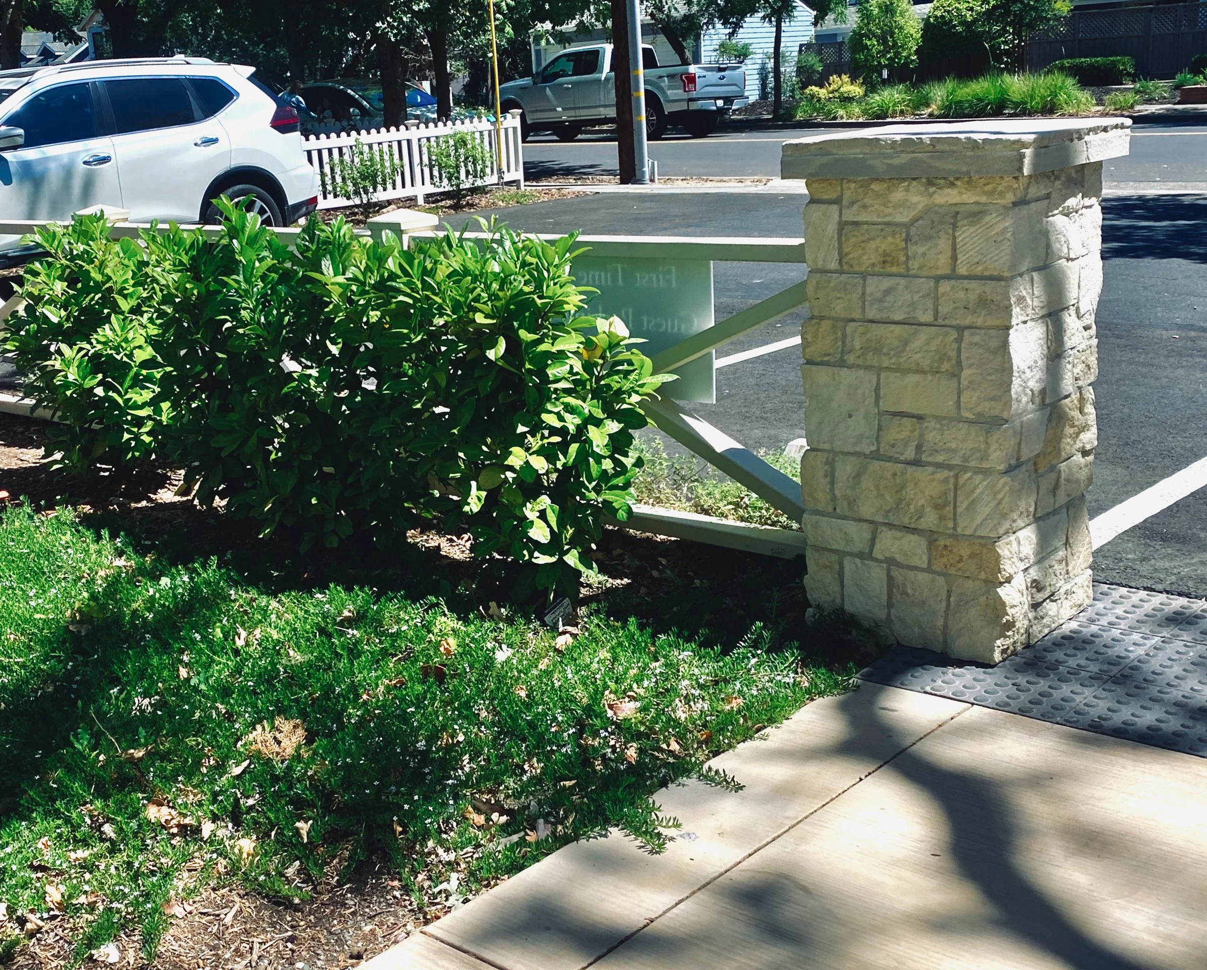 hedge for screening cars. Entry columns with lighting, "tactile" domes