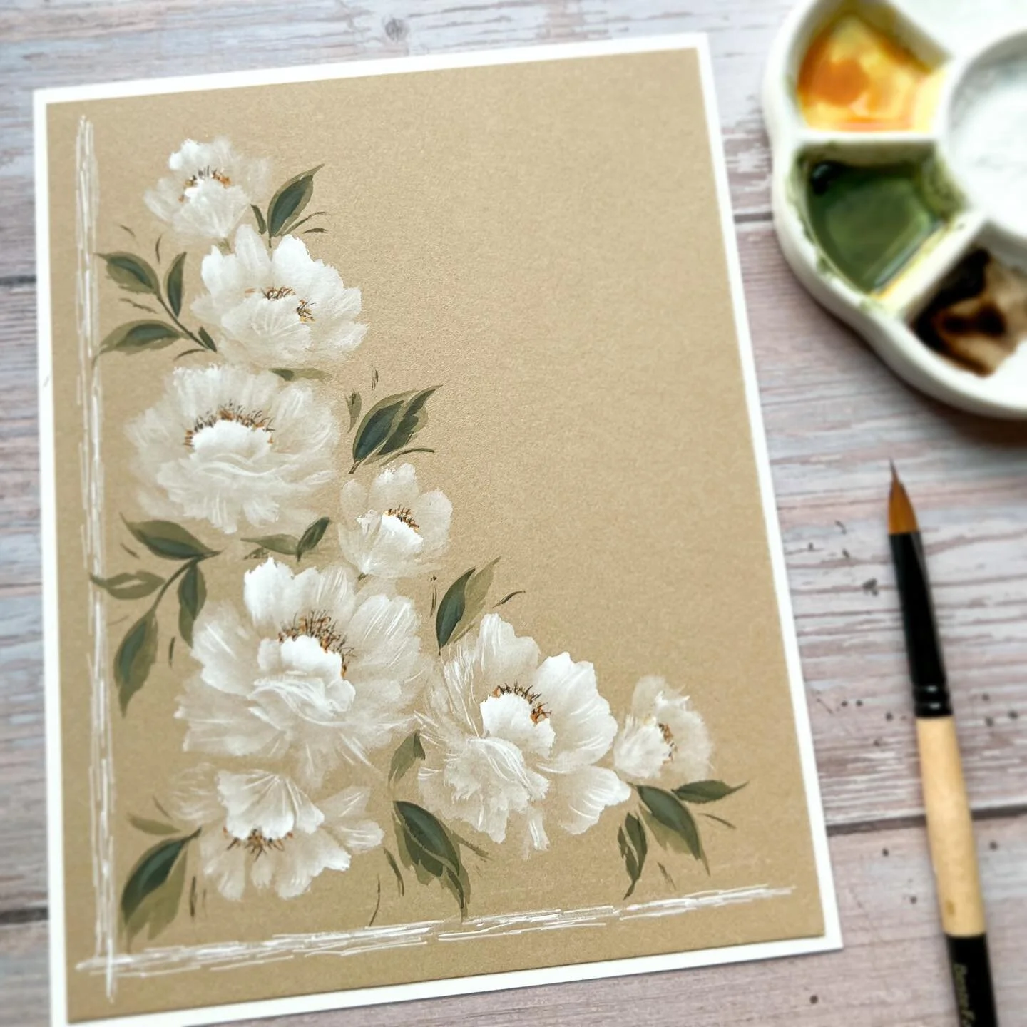 A few romantic florals for this lovely Sunday morning 🤍🌱 ⁣
⁣
Created with white gouache and a few watercolors: Quin gold, Sepia, &amp; Undersea green. Painted on Legion Stonehenge Kraft paper which is just so awesome to work with. Oh and my trusty 