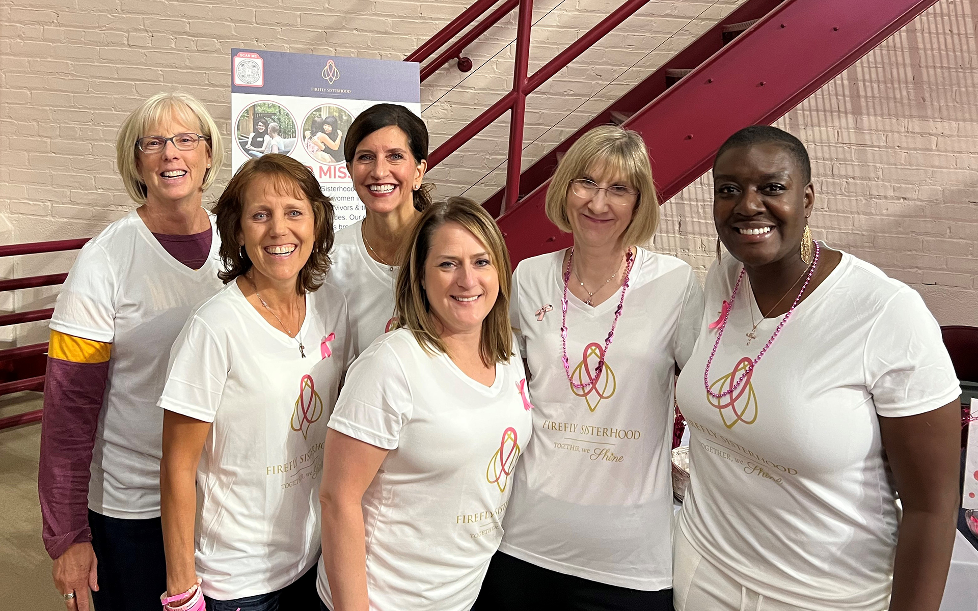 Women from Firefly Sisterhood standing together, symbolizing support, strength, and community