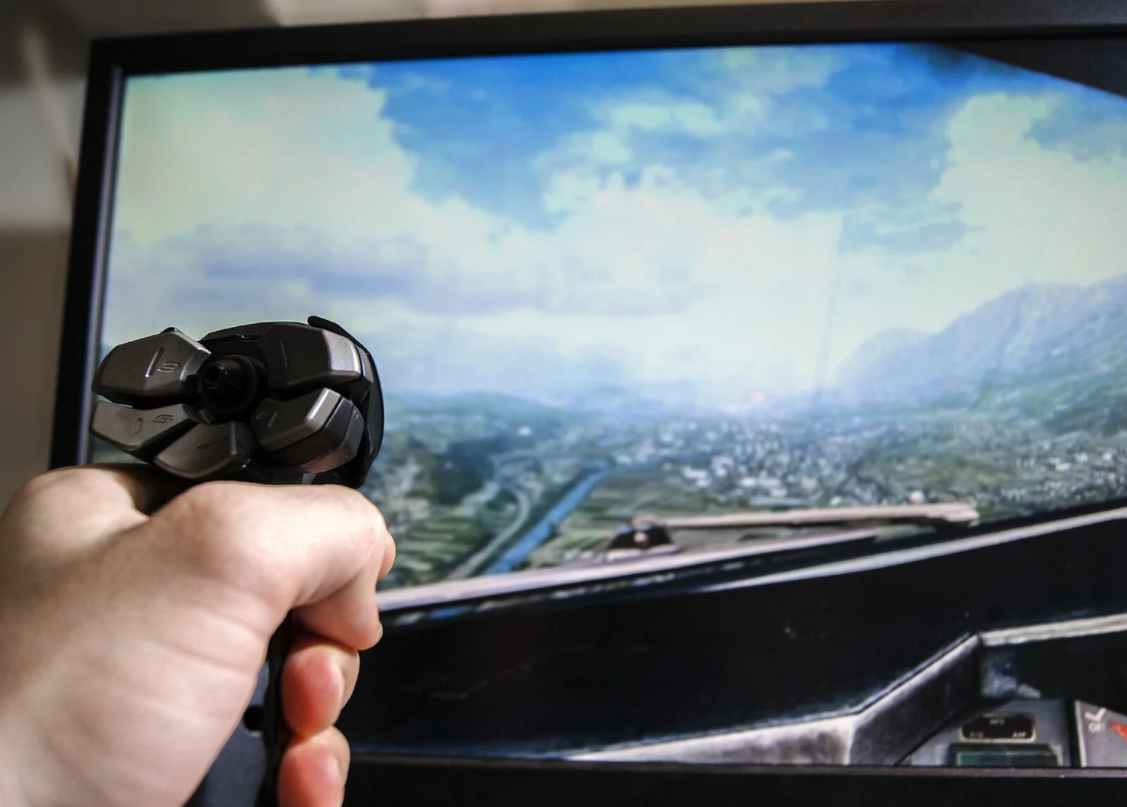 bigstock-Hand-on-joystick-playing-flig-112555265 (1).jpg