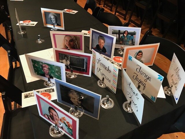 Cards with photos of powerful women* activists, authors and scholars that were placed on tables to form teams for quiz night.