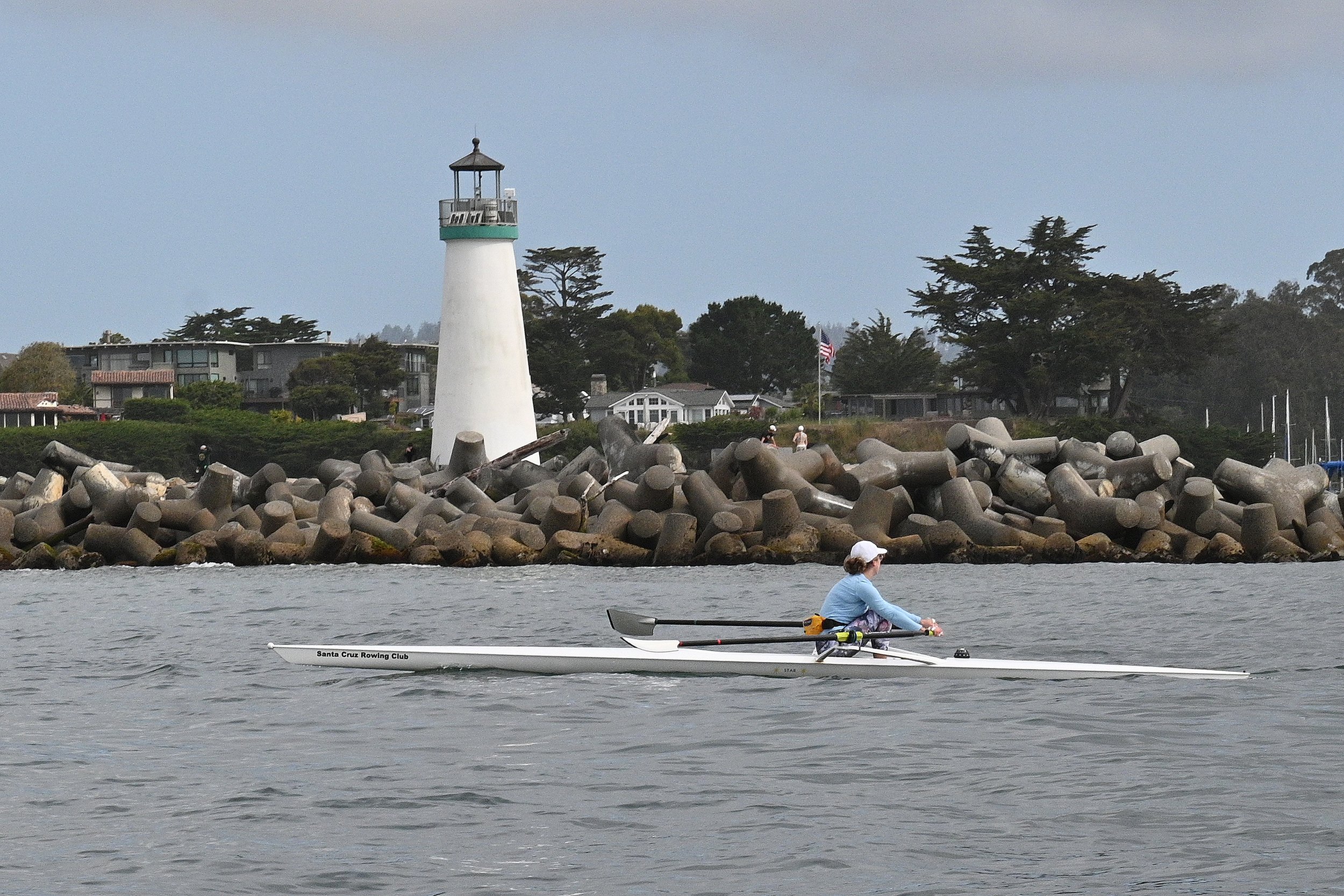 Rower heading out of the harbor.