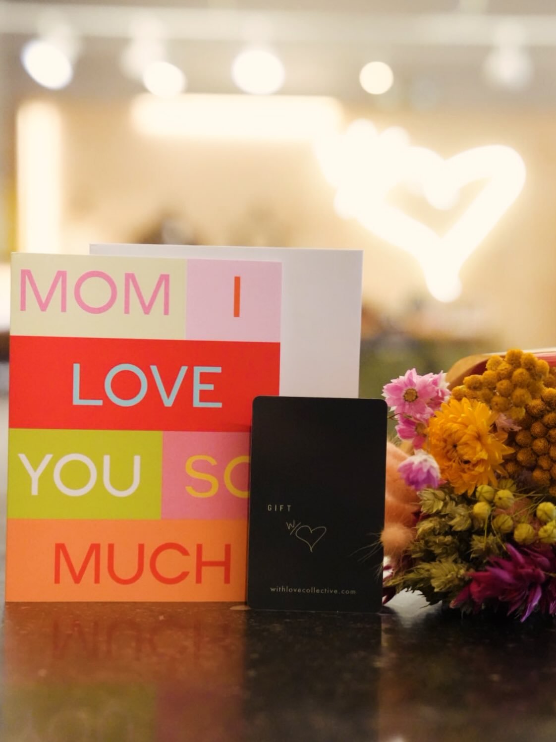 Celebrate Mother&rsquo;s Day with a To Mom, withlove Gift Set that includes:

💳 $100 withlove Classic Gift Card

🩶 Mother&rsquo;s Day Greeting Card printed by local woman owned business Bon Femmes,

💐 Dried Flower Bouquet Mix by Penny + Clover 

T