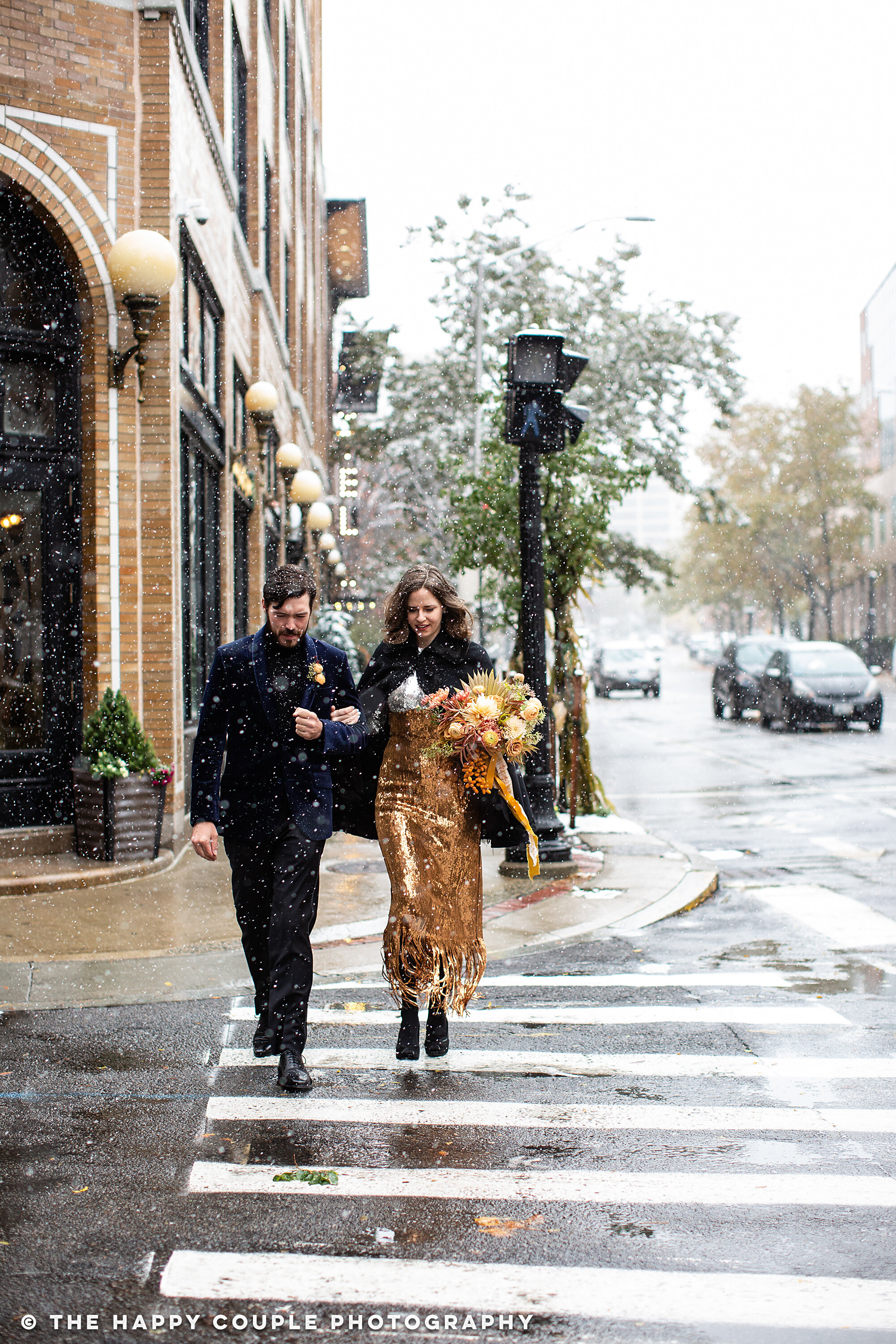 providence city hall elopement, bride and groom cross street in snow