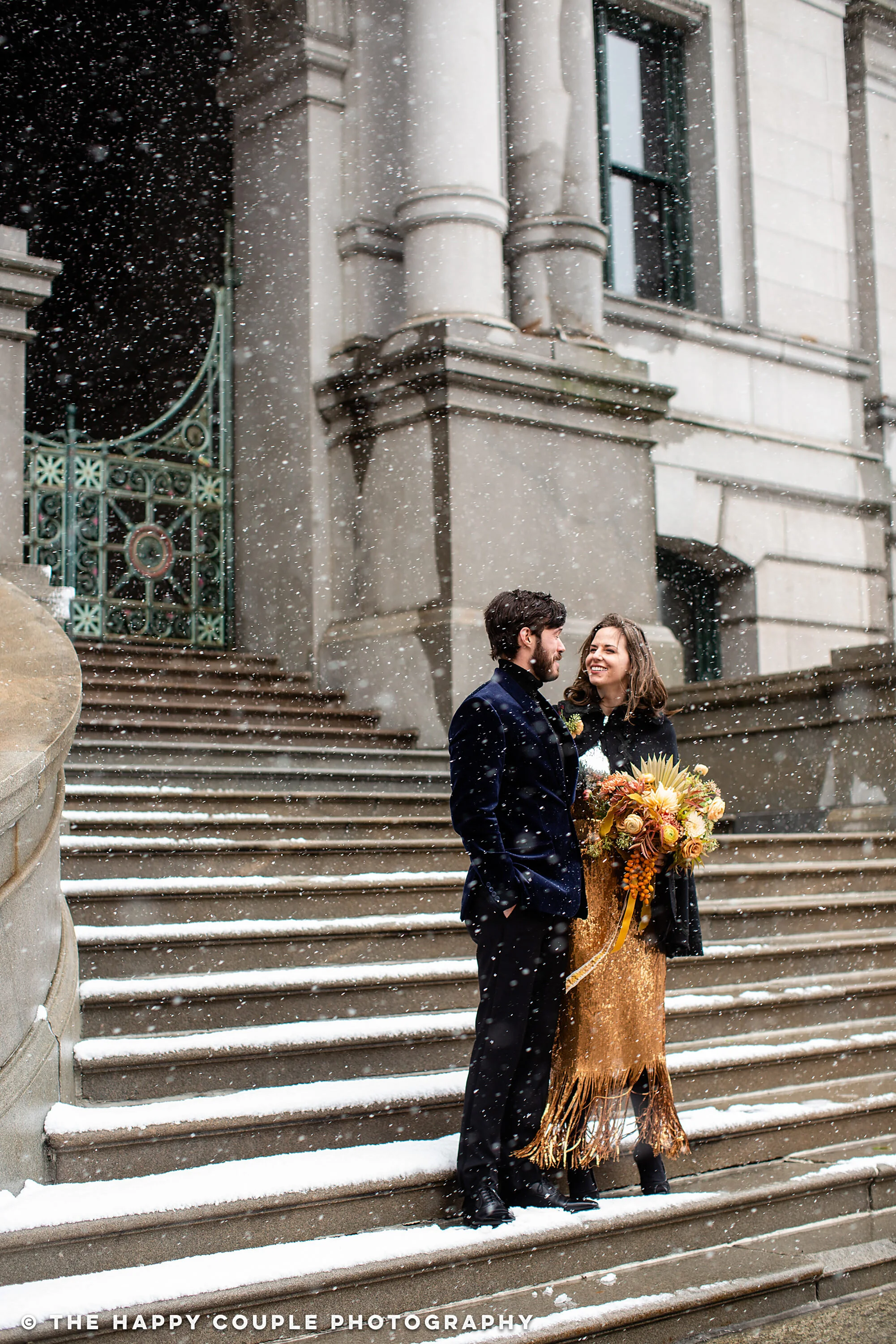 providence city hall elopement, bride and groom on steps of city hall in snow