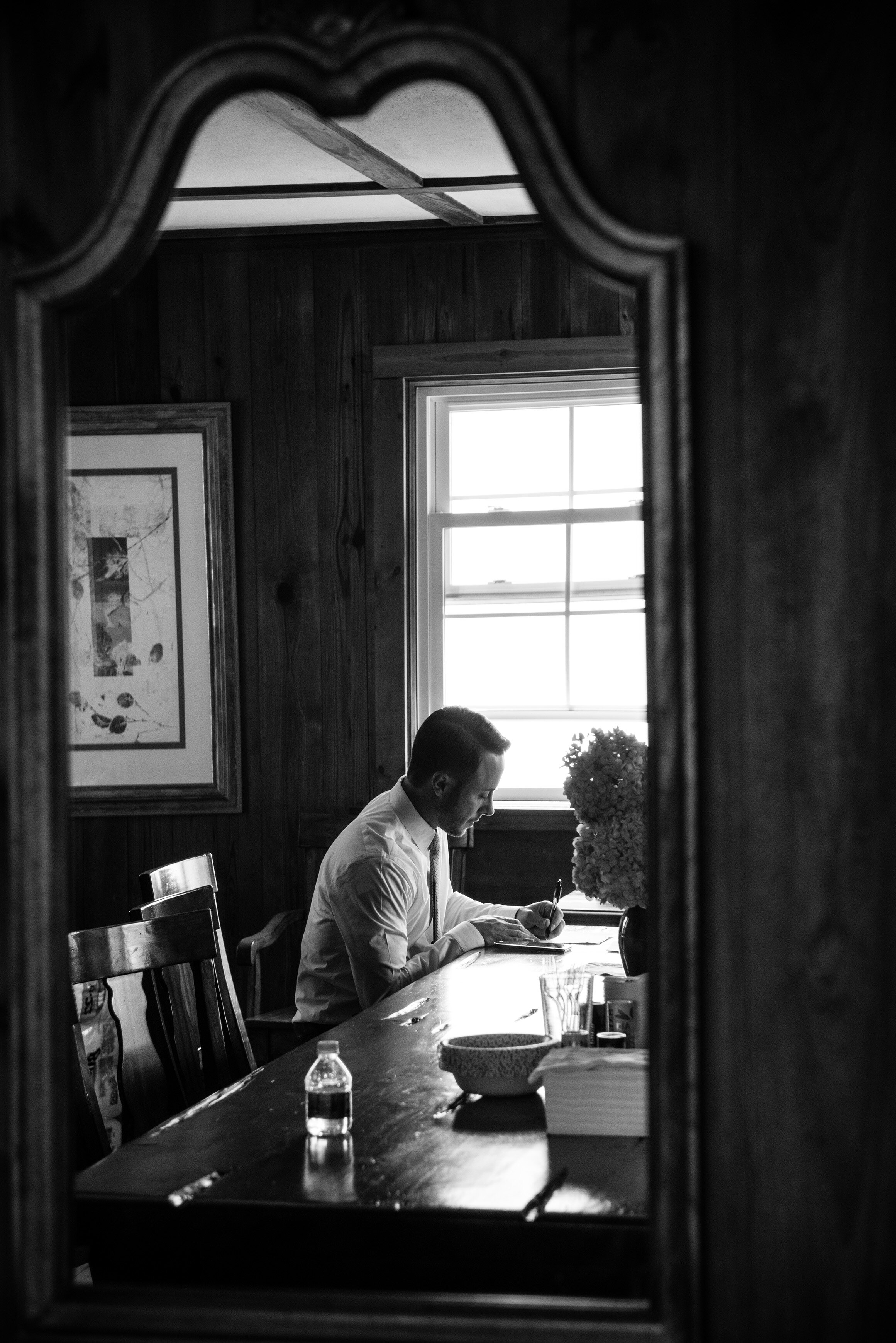 Seaside cape cod microwedding, groom writing vows