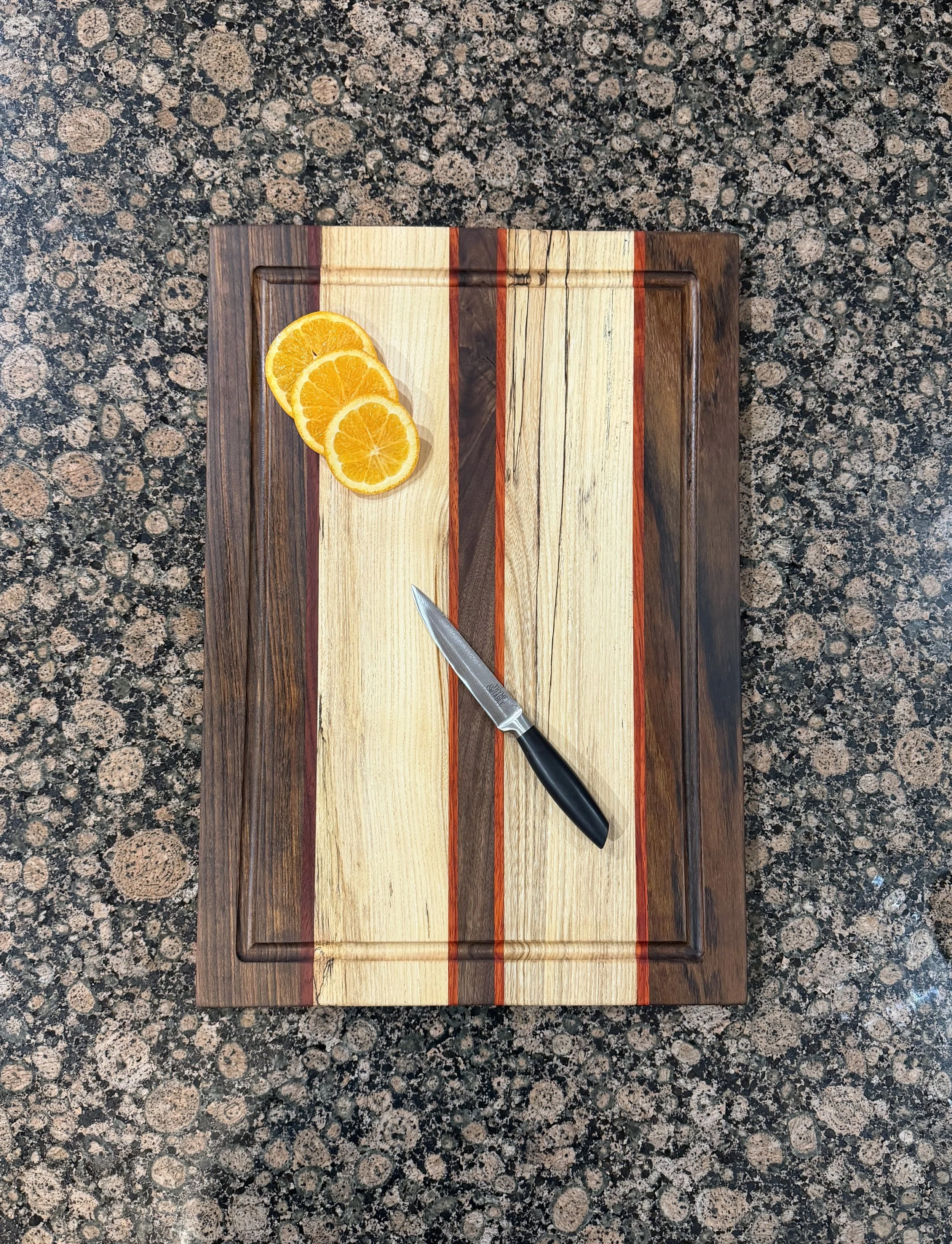 Exotic Padauk, Amazakoue, Spalted Hackberry and Walnut Cutting/Charcuterie Board with Juice Groove
