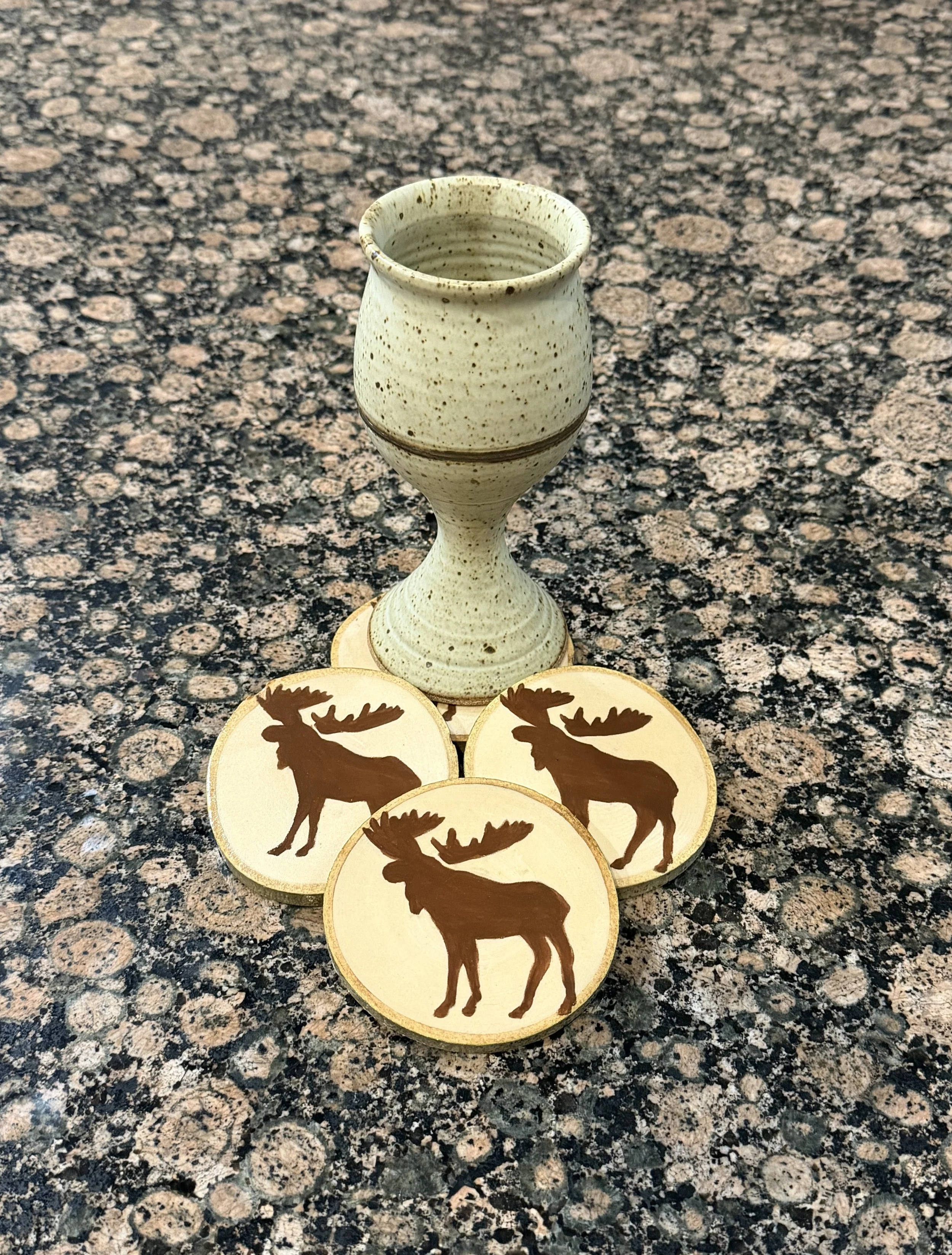 4 Piece Large Moose Coaster Set on Aspen
