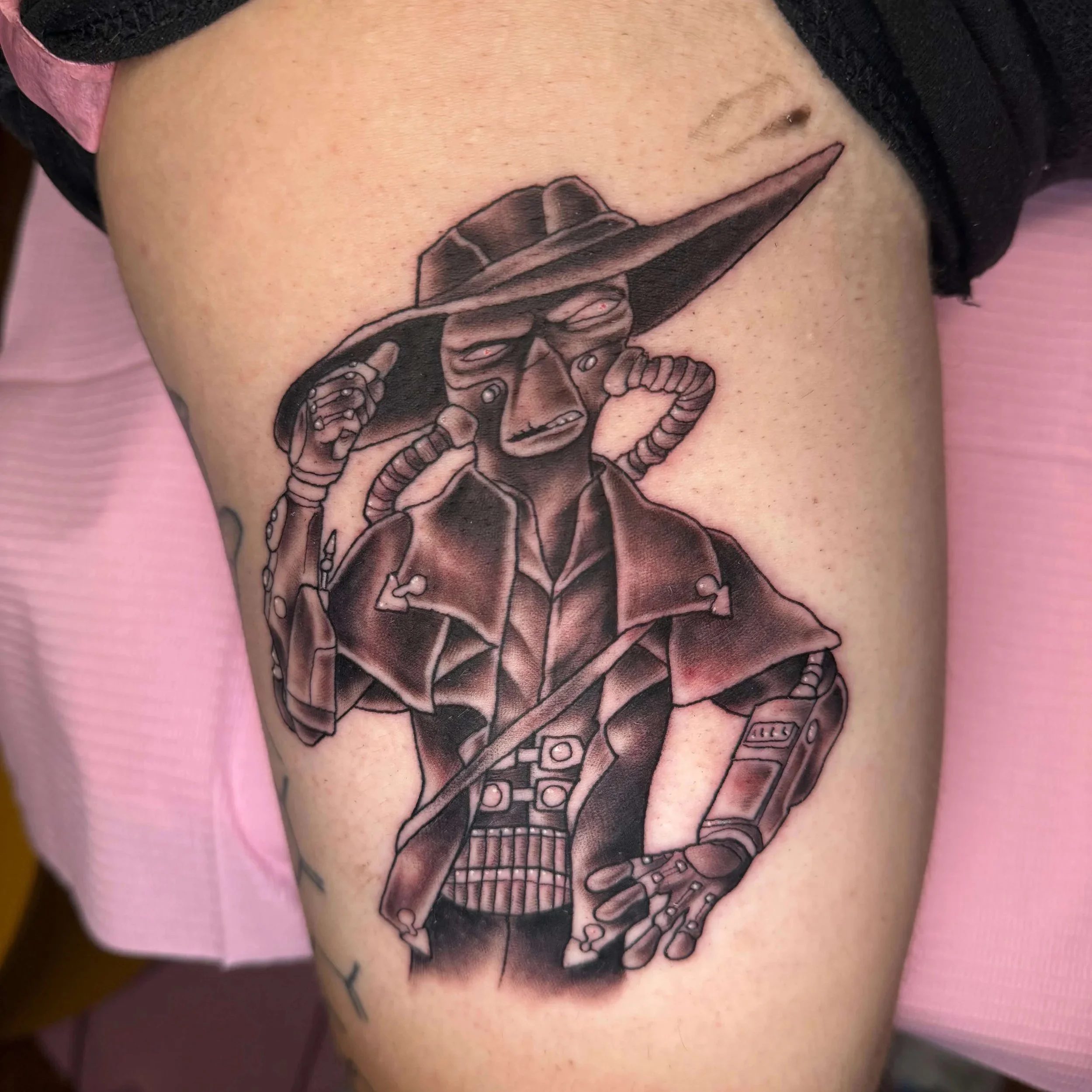 Star Wars Cad Bane bounty Hunter bicep tattoo by Erin Peterson at Integrity tattoo in Denton Texas.