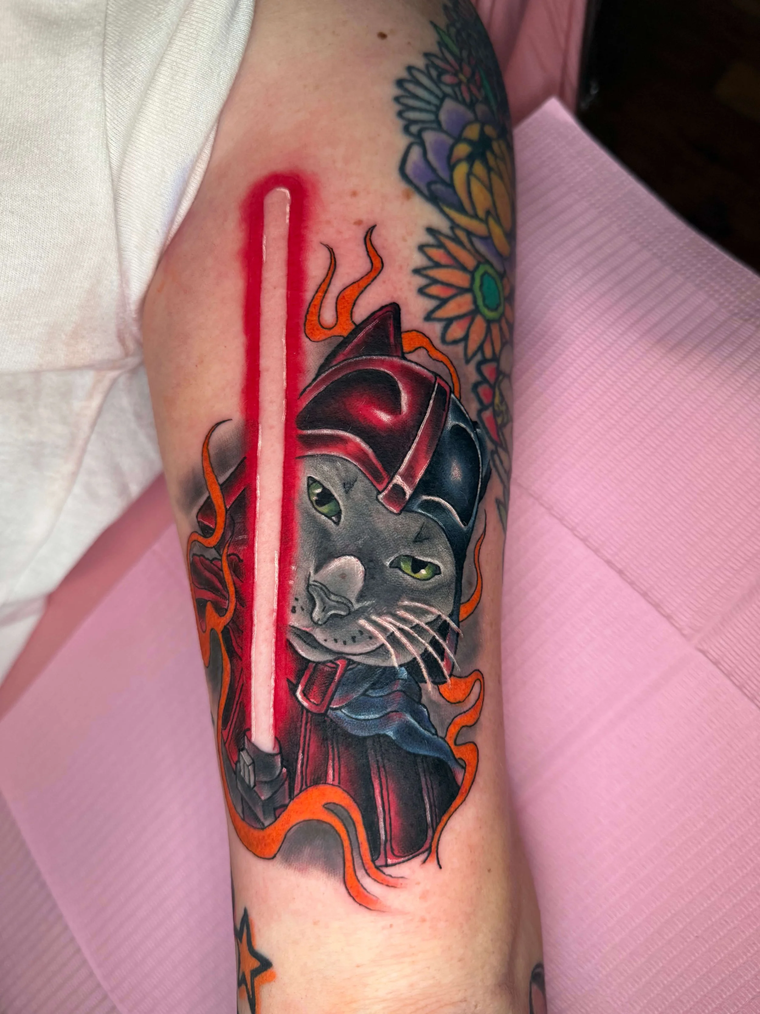 Darth Vader cat tattoo with red lightsaber by Erin Peterson at Integrity Tattoo in Denton Texas