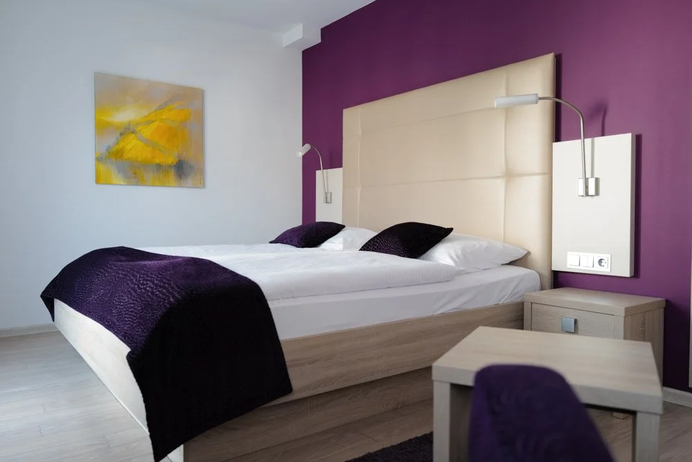 Deluxe-Doppelzimmer-109-Bett3.jpg