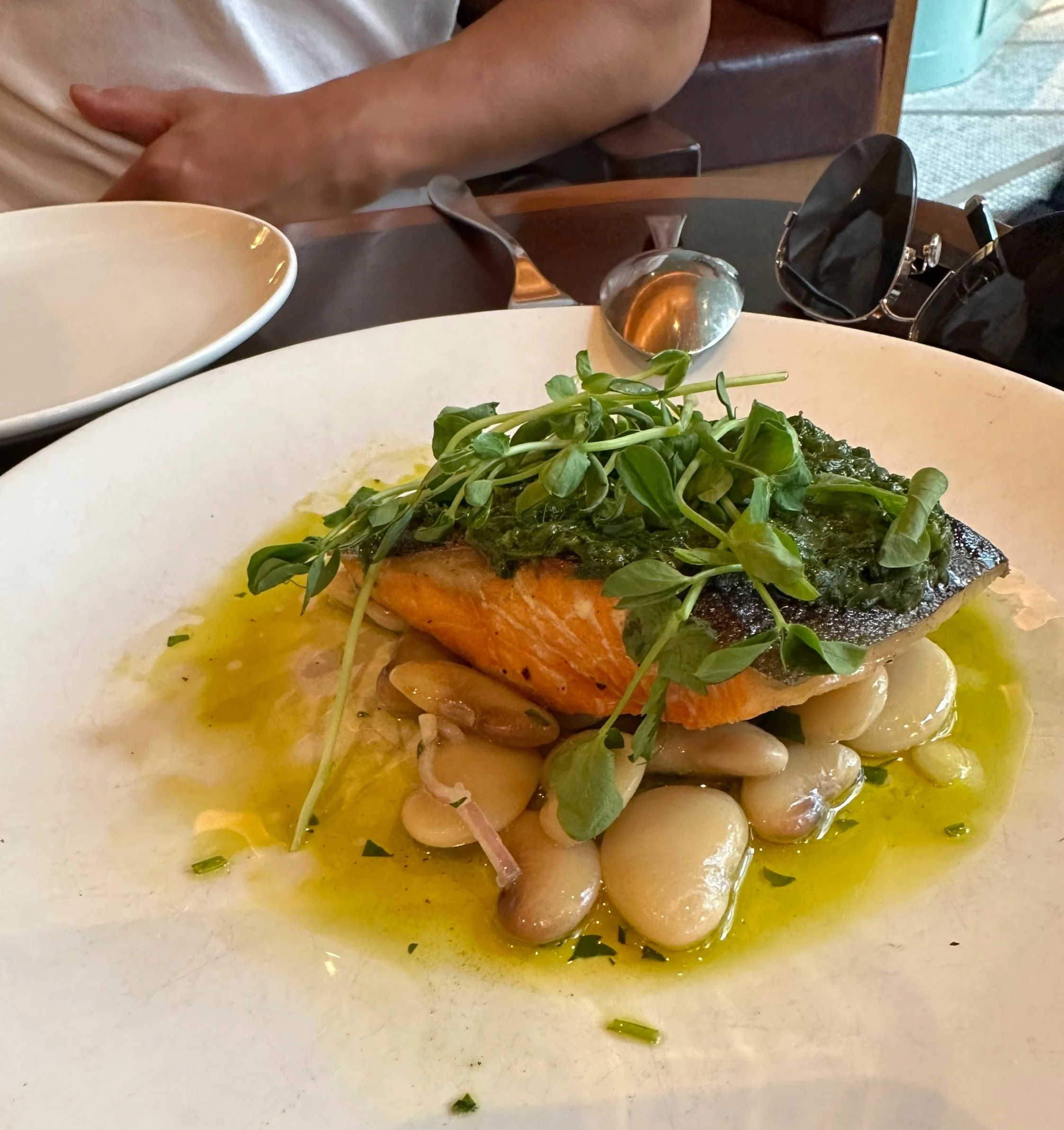  Market fish with pea leaf pesto and marinated beans  
