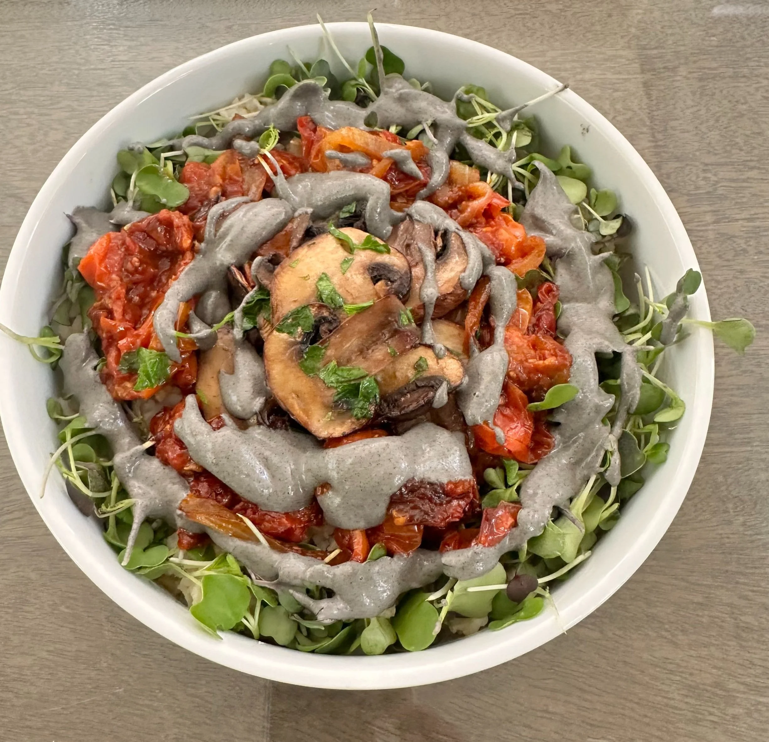 Savory Roasted Veggie & Grain Bowl with Creamy Cashew & Black Tahini Sauce