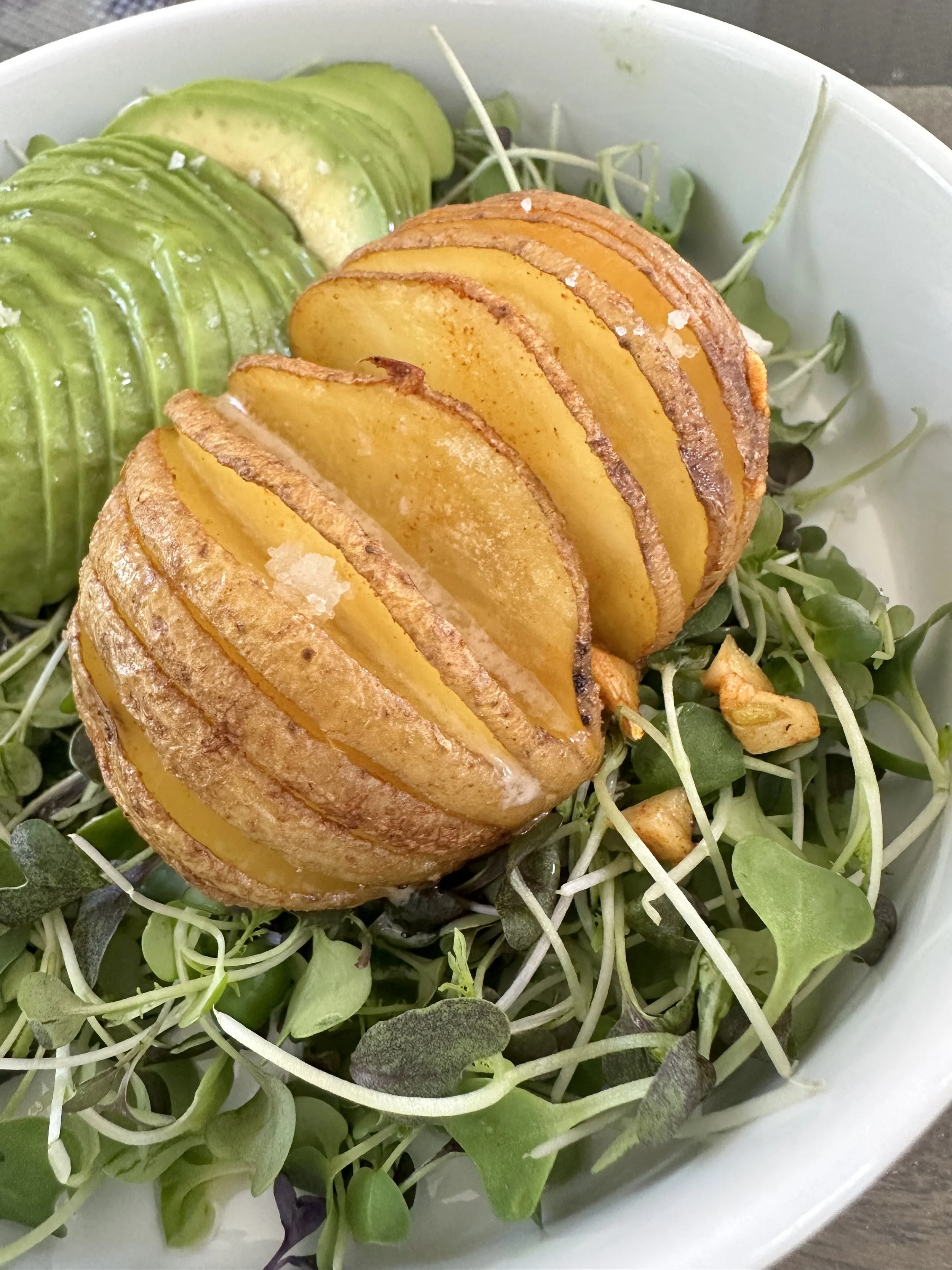 Crispy Vegan Hasselback Potatoes with Garlic Drizzle