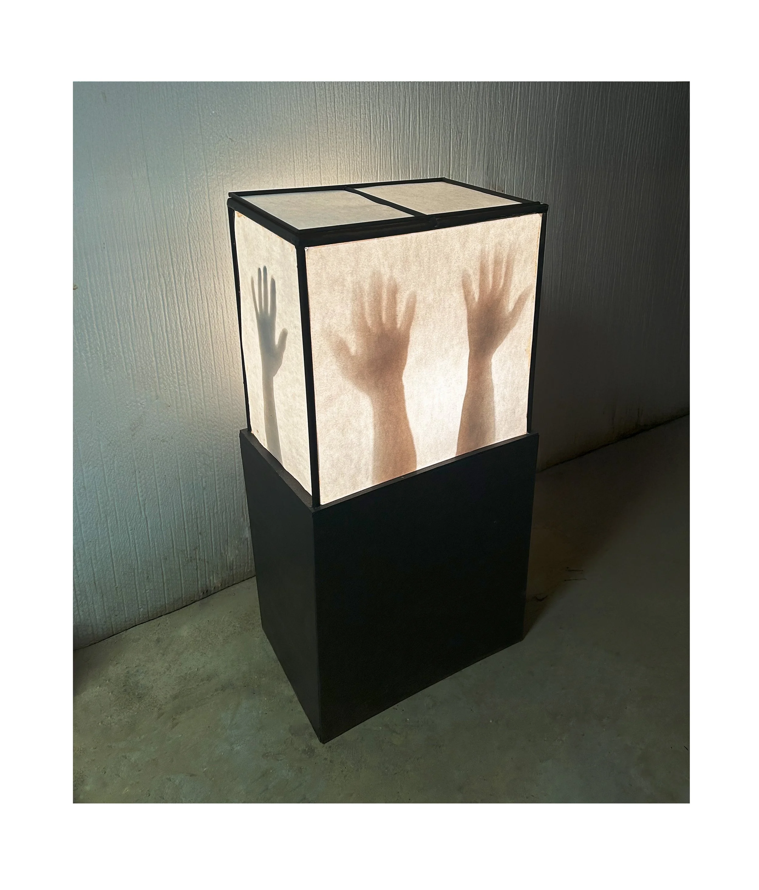 109. 'Lamp of Hands', Wood, paper, light by James DeBay