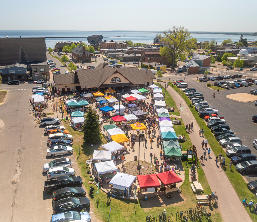An aerial view of the Farmers Market tents set up on the Plaza.