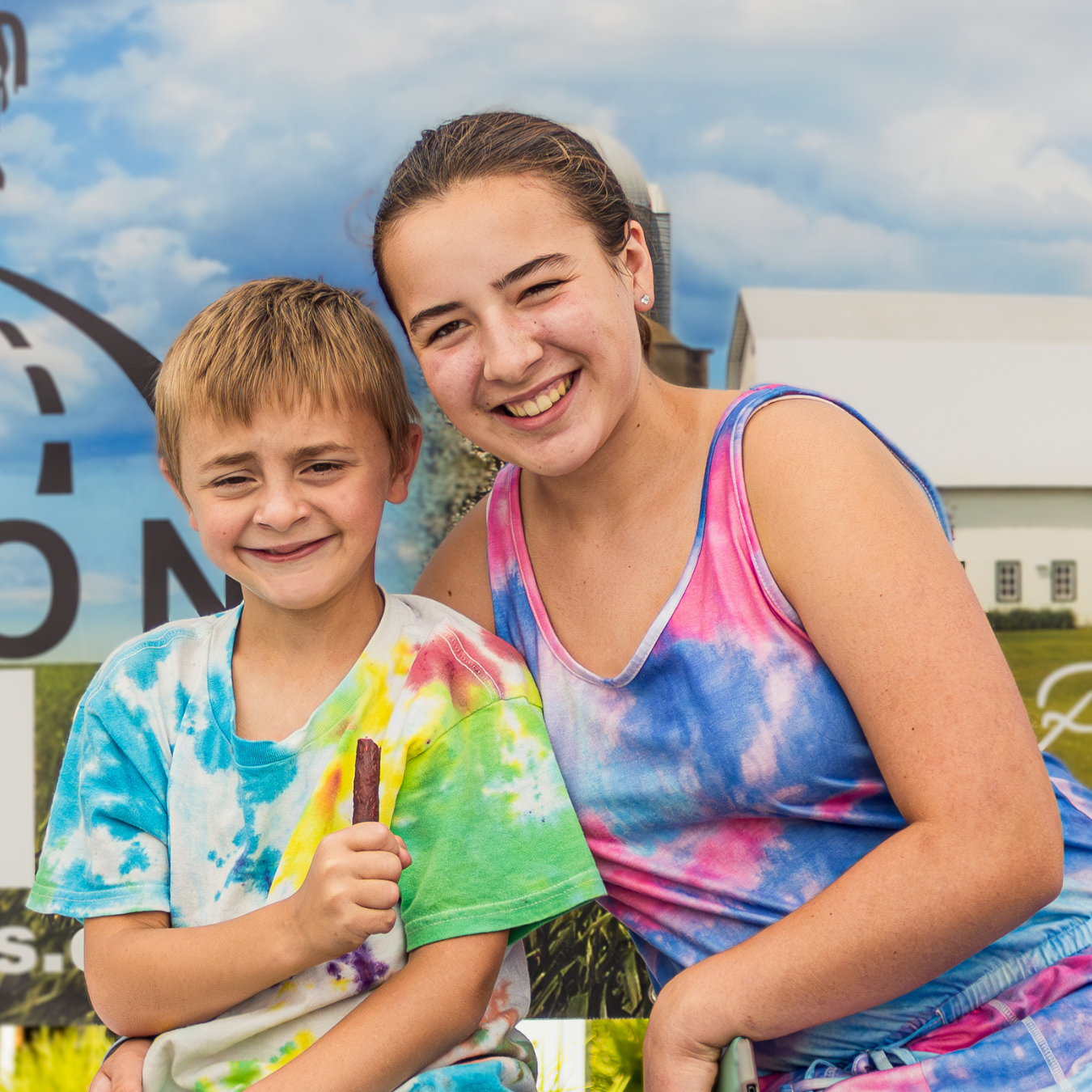 two young vendors at the market