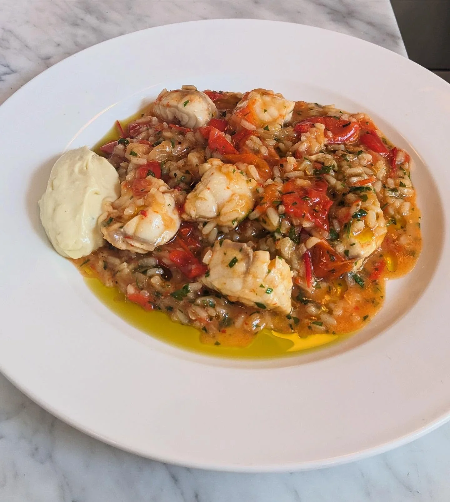 Monkfish, Stewed Peppers, Rice & Aioli. This dish is inspired by the Portuguese monkfish rice dish which I, cold and soaked to the bone, ate in Lisbon one rainy January evening back in 2015. Life flowed back through me afterwards.