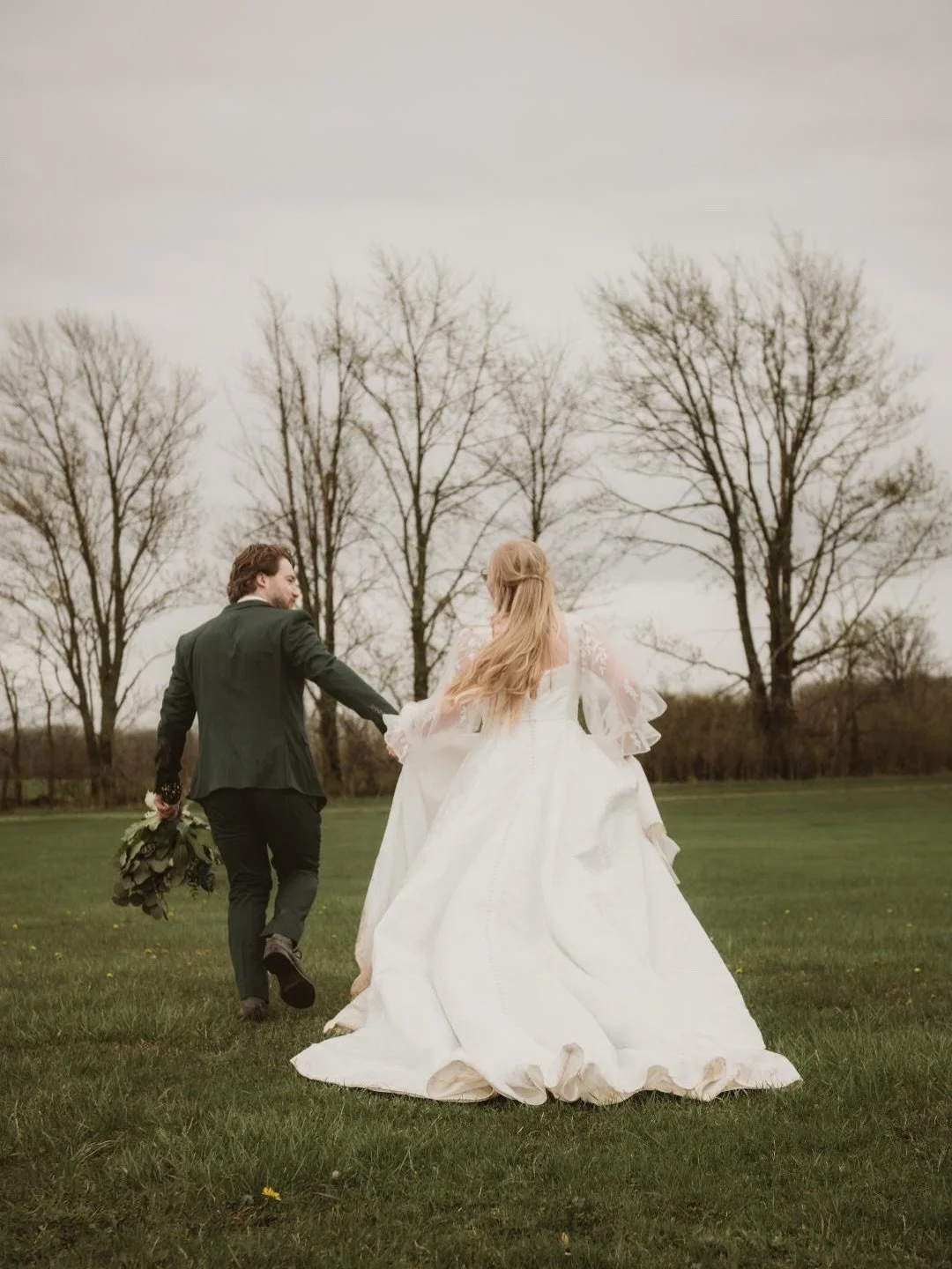 Our first wedding of the year 🤍 Lena &amp; Anthony 

April showers showed up, but nothing could stop this day from feeling magical. Lena walked barefoot through the field and created the most beautiful, dreamy moments. 

Her wedding dress by @taniao