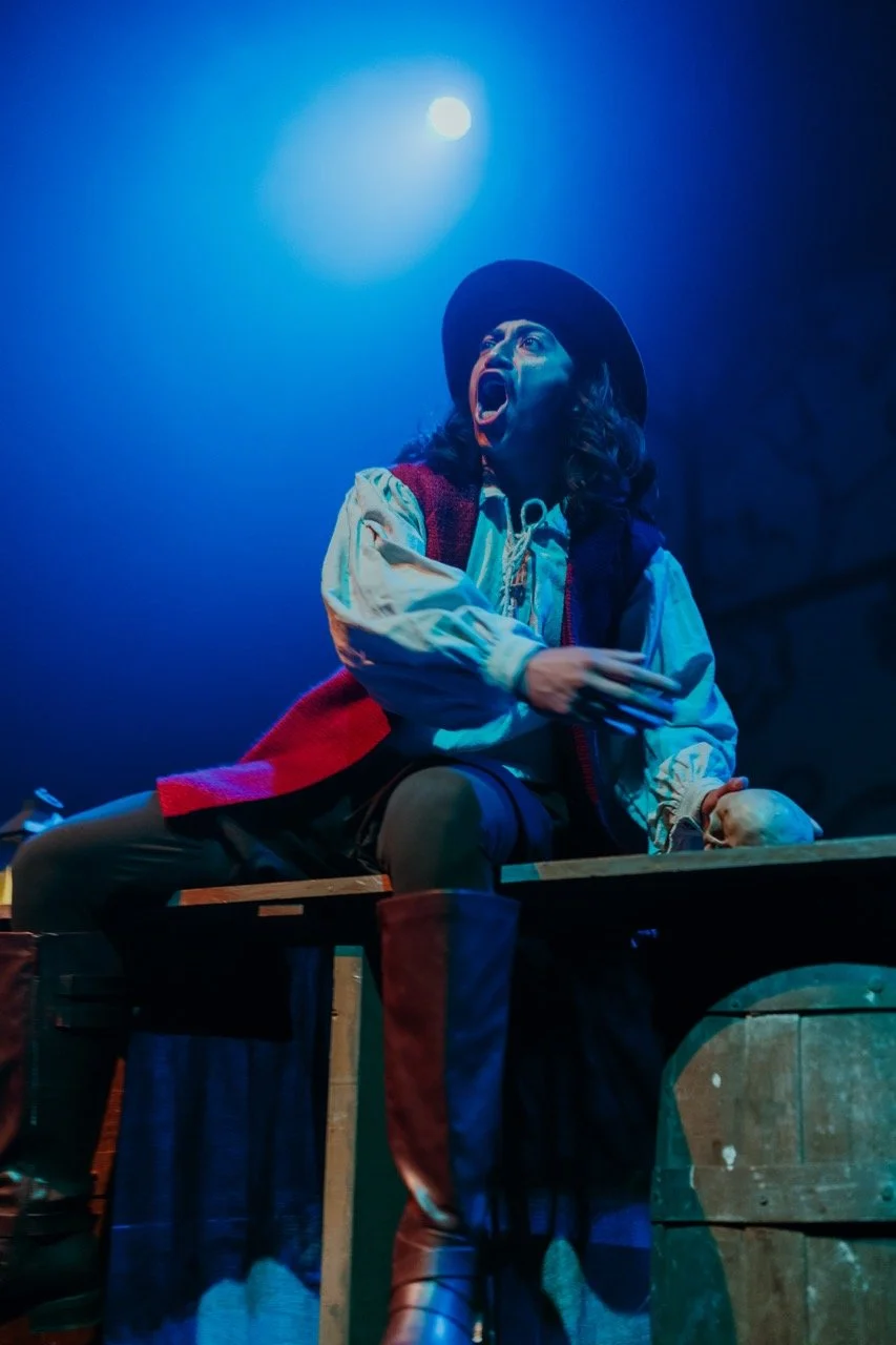 Theatrical performance with actor in period costume