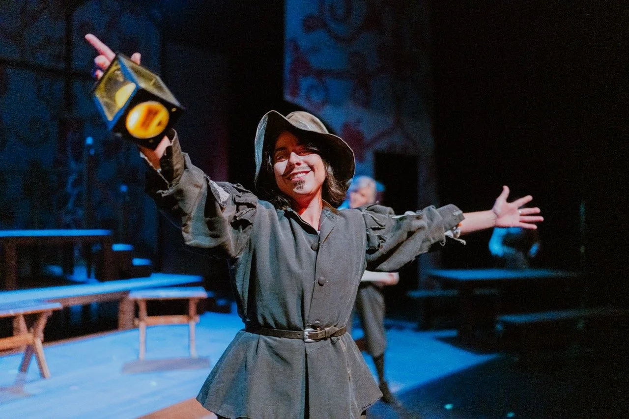 Person in medieval costume performing on stage