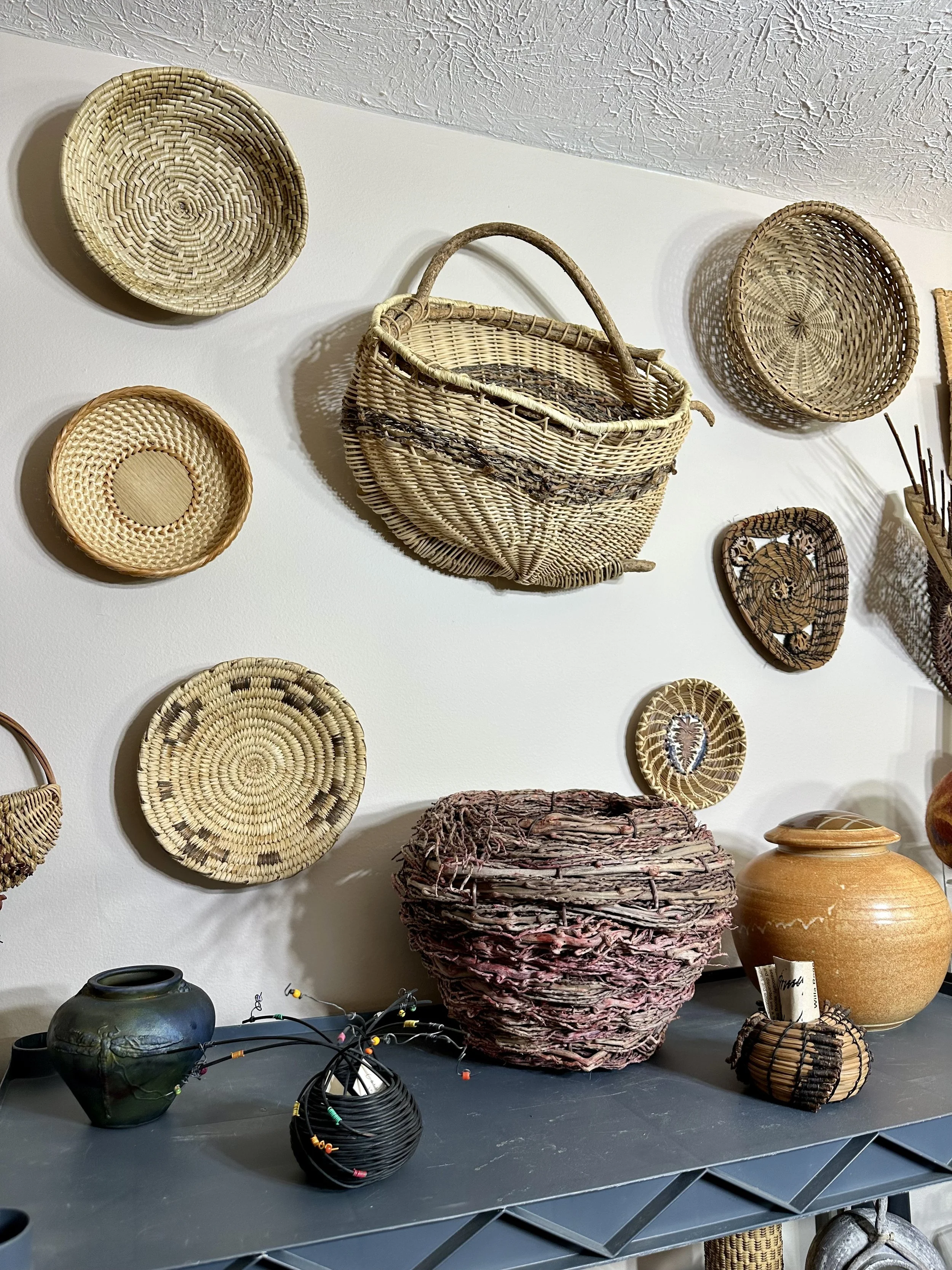 Various decorative baskets and art