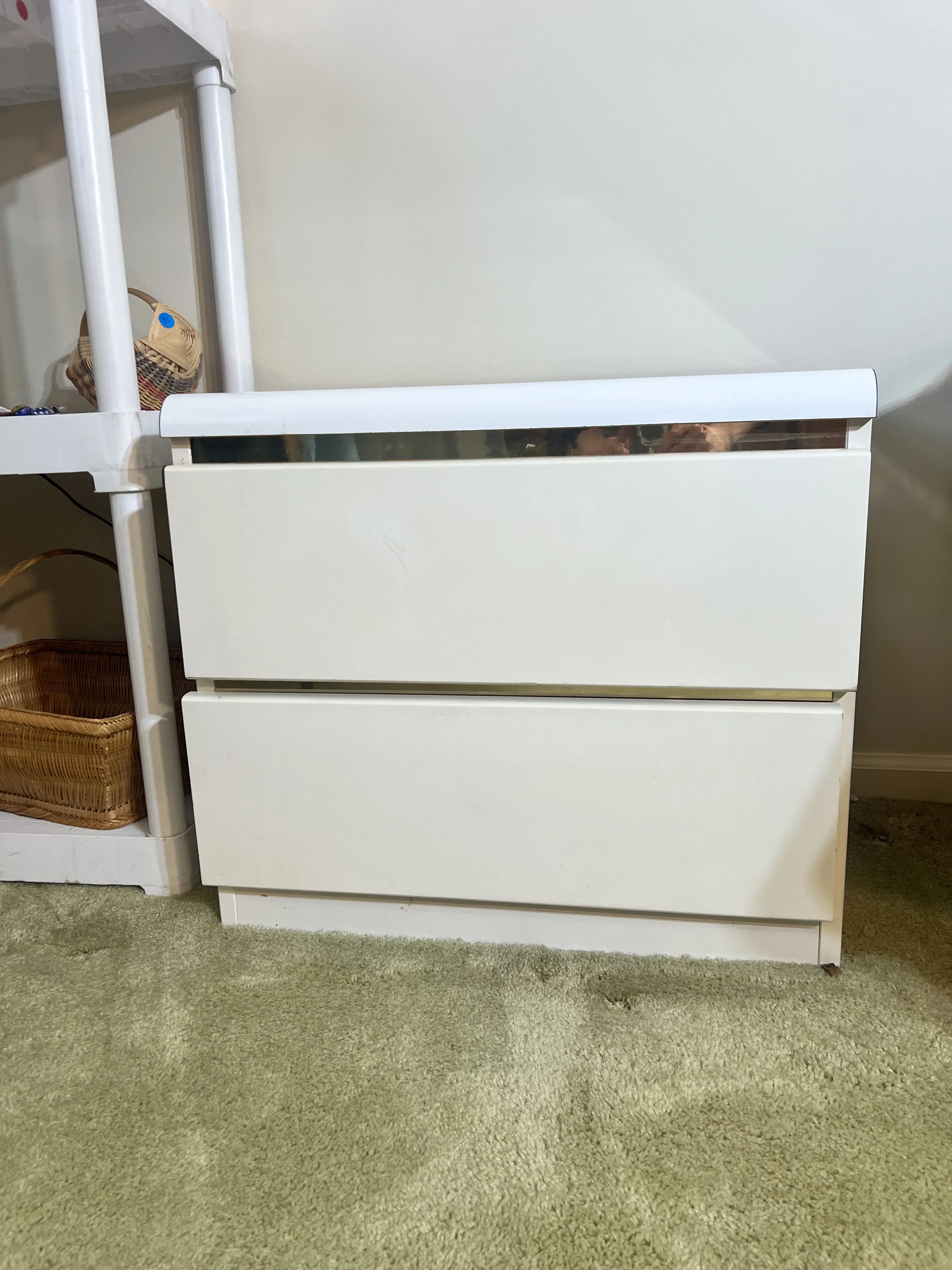 2-drawer white nightstand with gold-tone accents