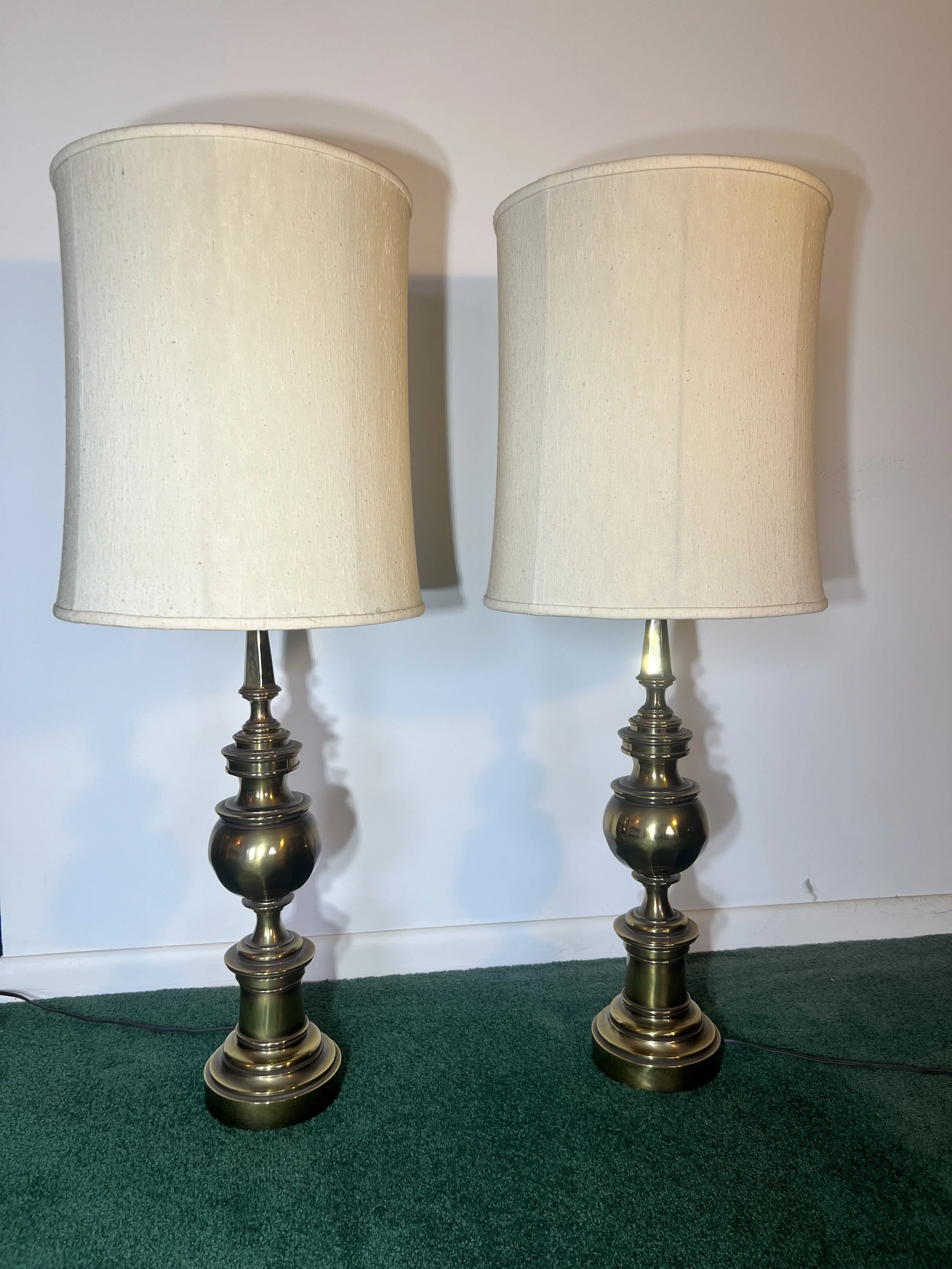 Pair of Stiffel heavy brass-finished pedestal table lamps with tall cream drum shades