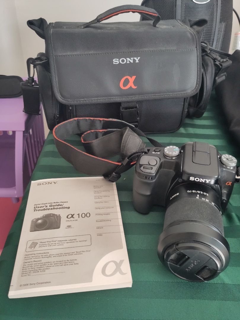 Sony Alpha 100 DSLR digital camera equipped with a Sony 18-70mm macro lens