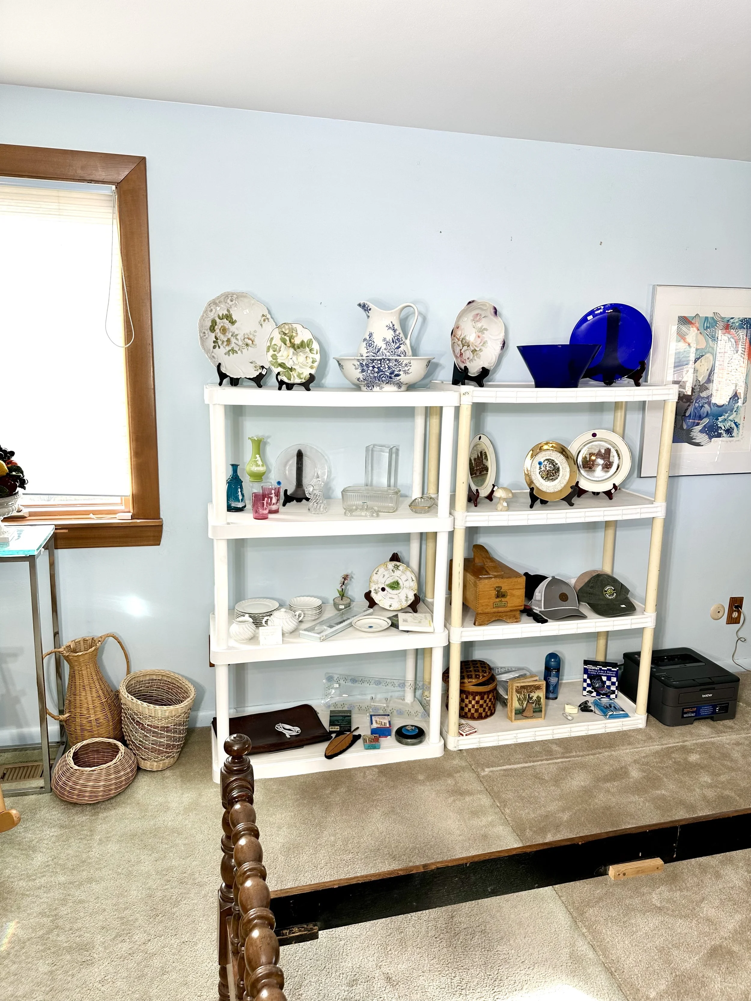 various decorative plates and glassware