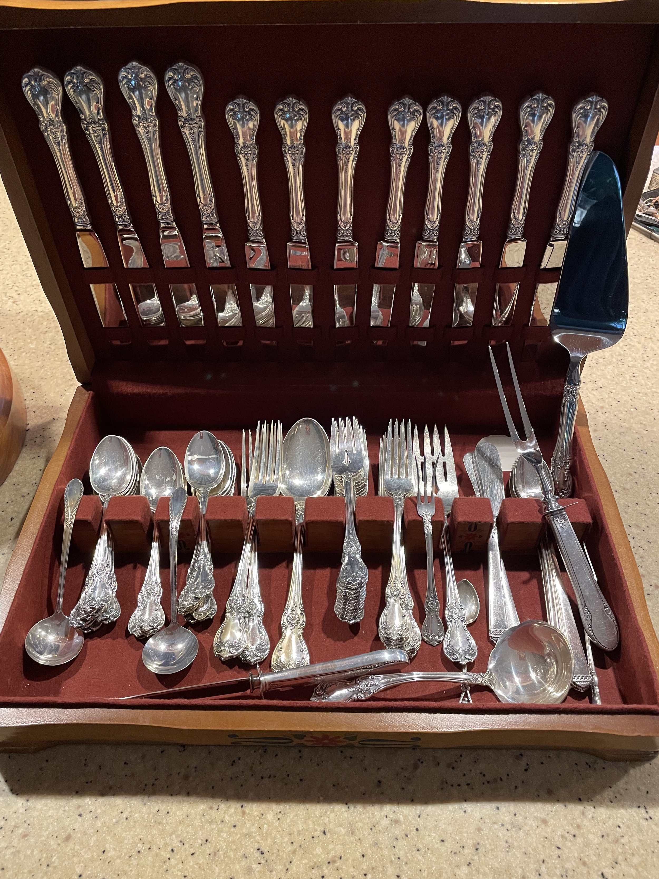 Multi-piece solid sterling silver flatware