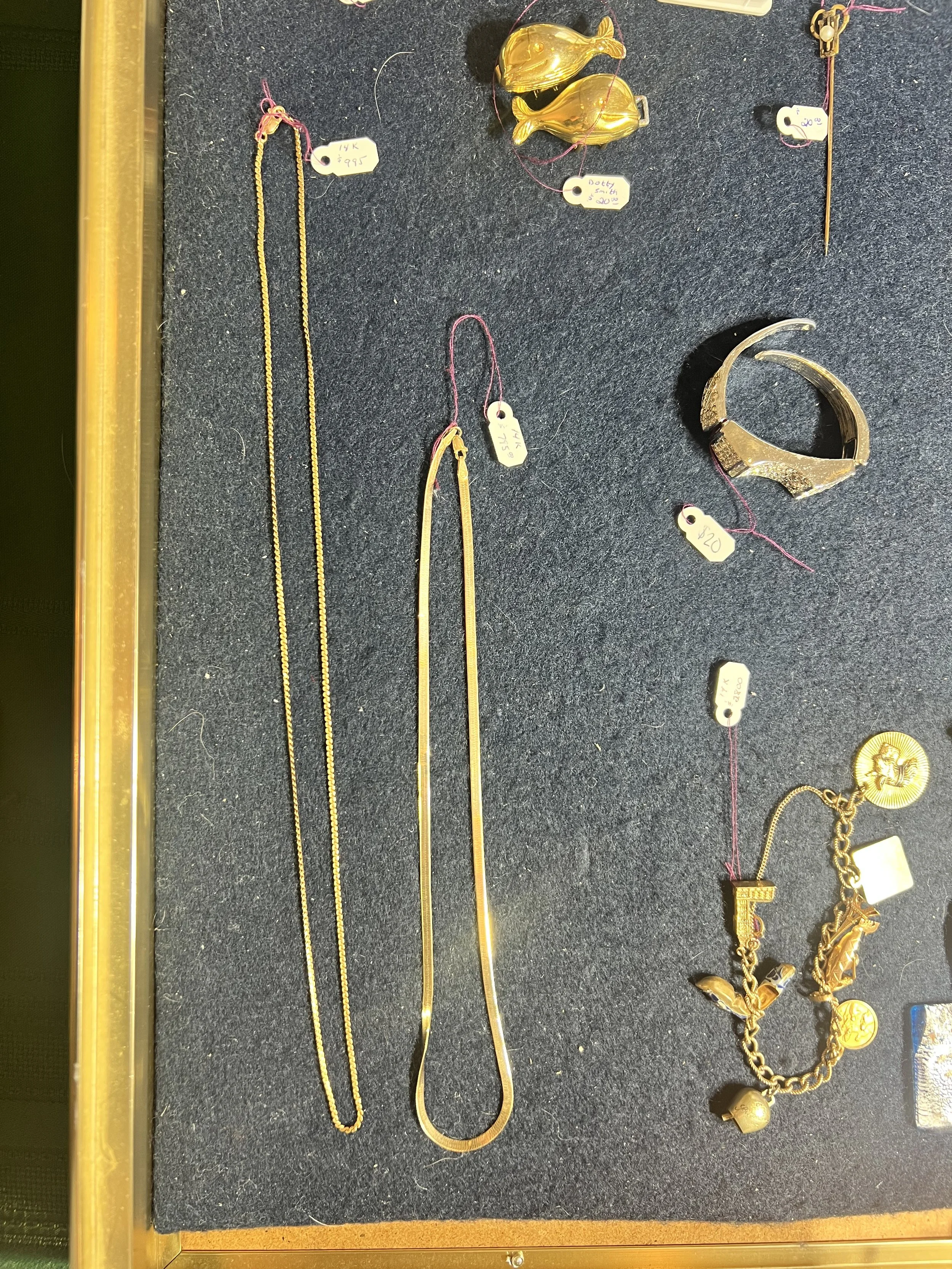 Jewelry: 14K gold chains, charms, bracelets, and vintage brooches