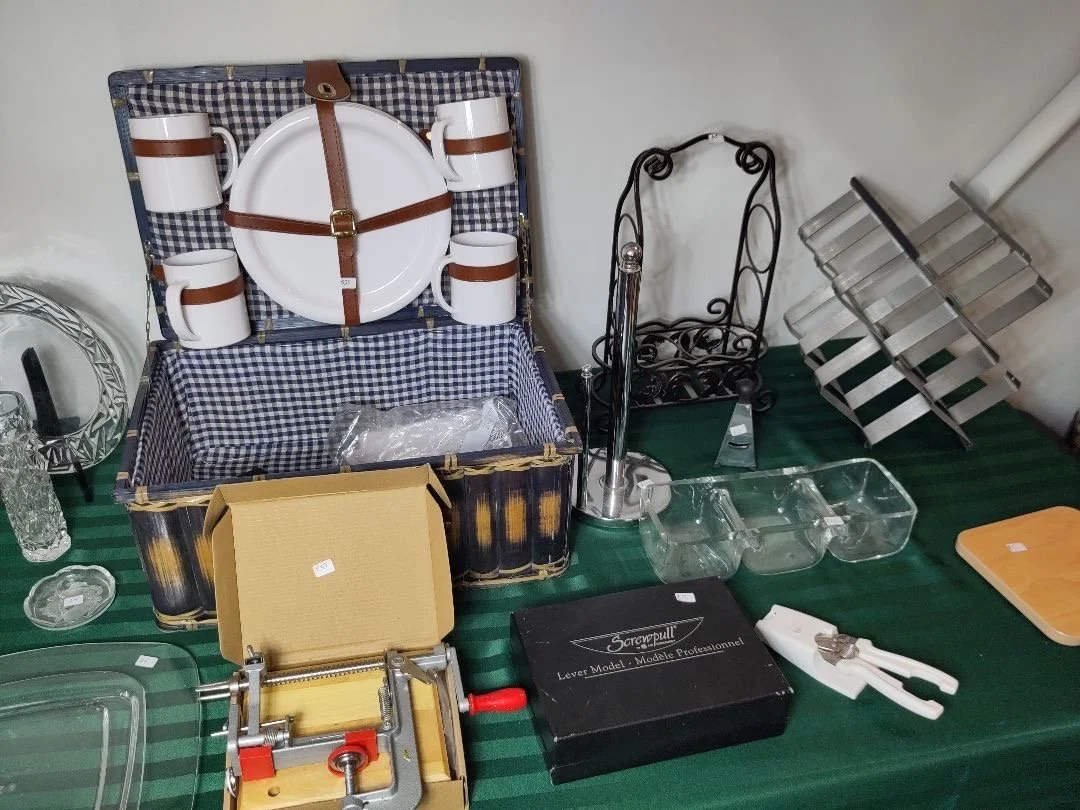 Woven picnic basket lined in blue-and-white check fabric