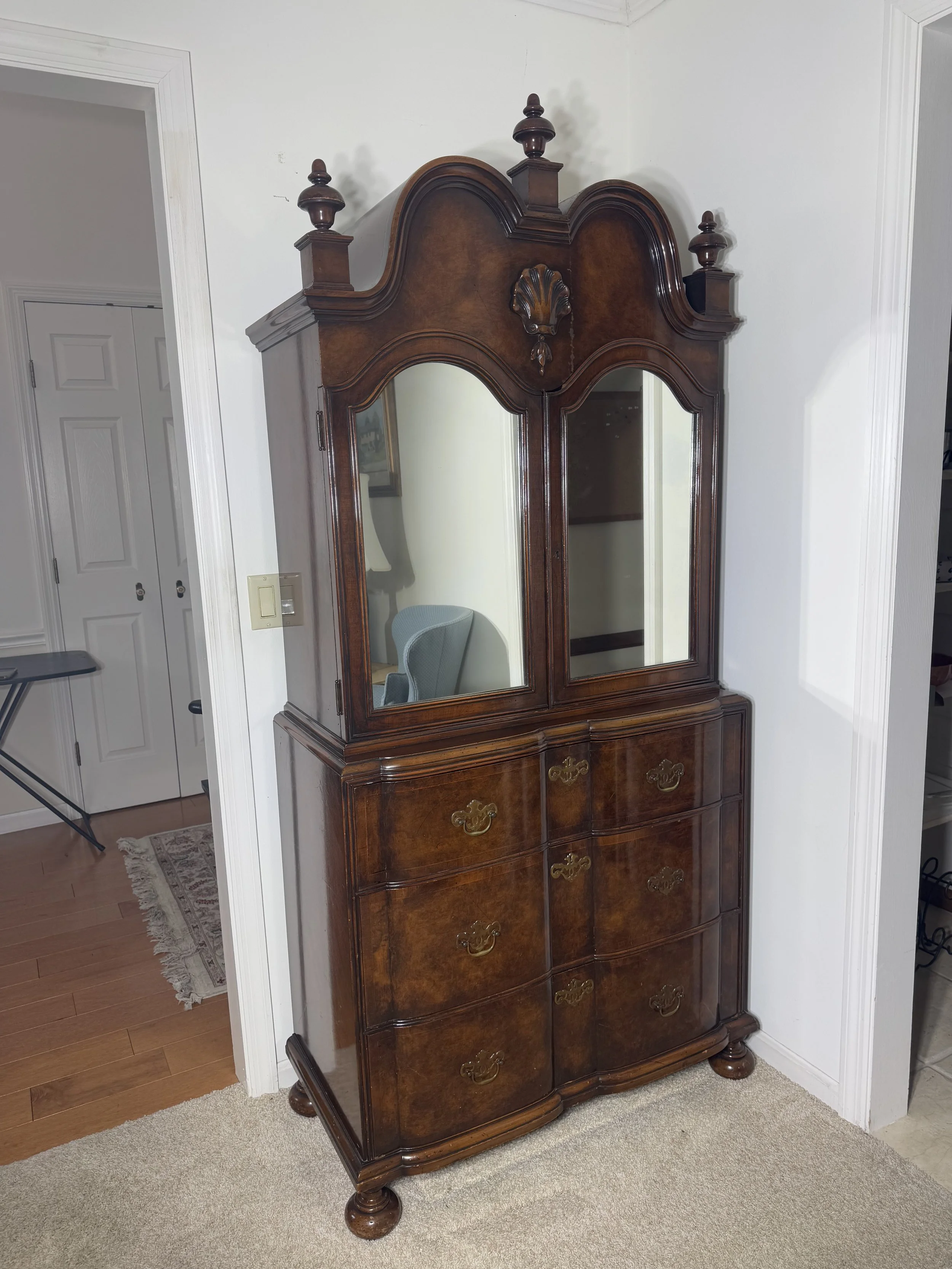vintage Chippendale style mahogany highboy chest of drawers with mirrored cabinets