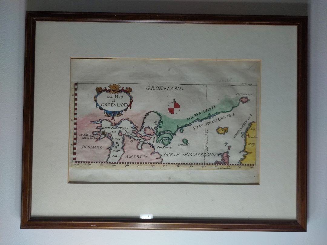 A framed cartographic map of Greenland