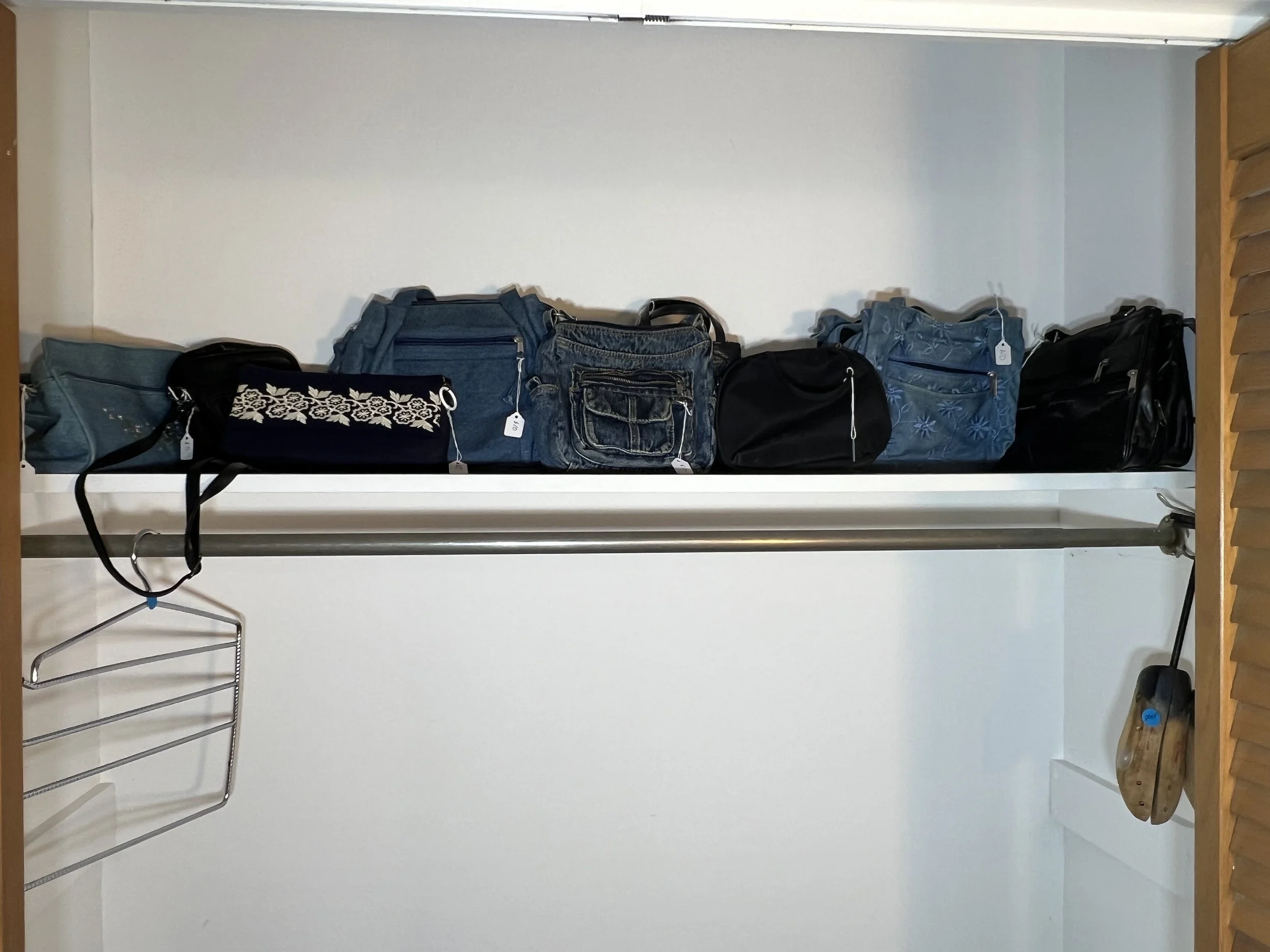 Variety of practical and stylish handbags including denim and leather styles