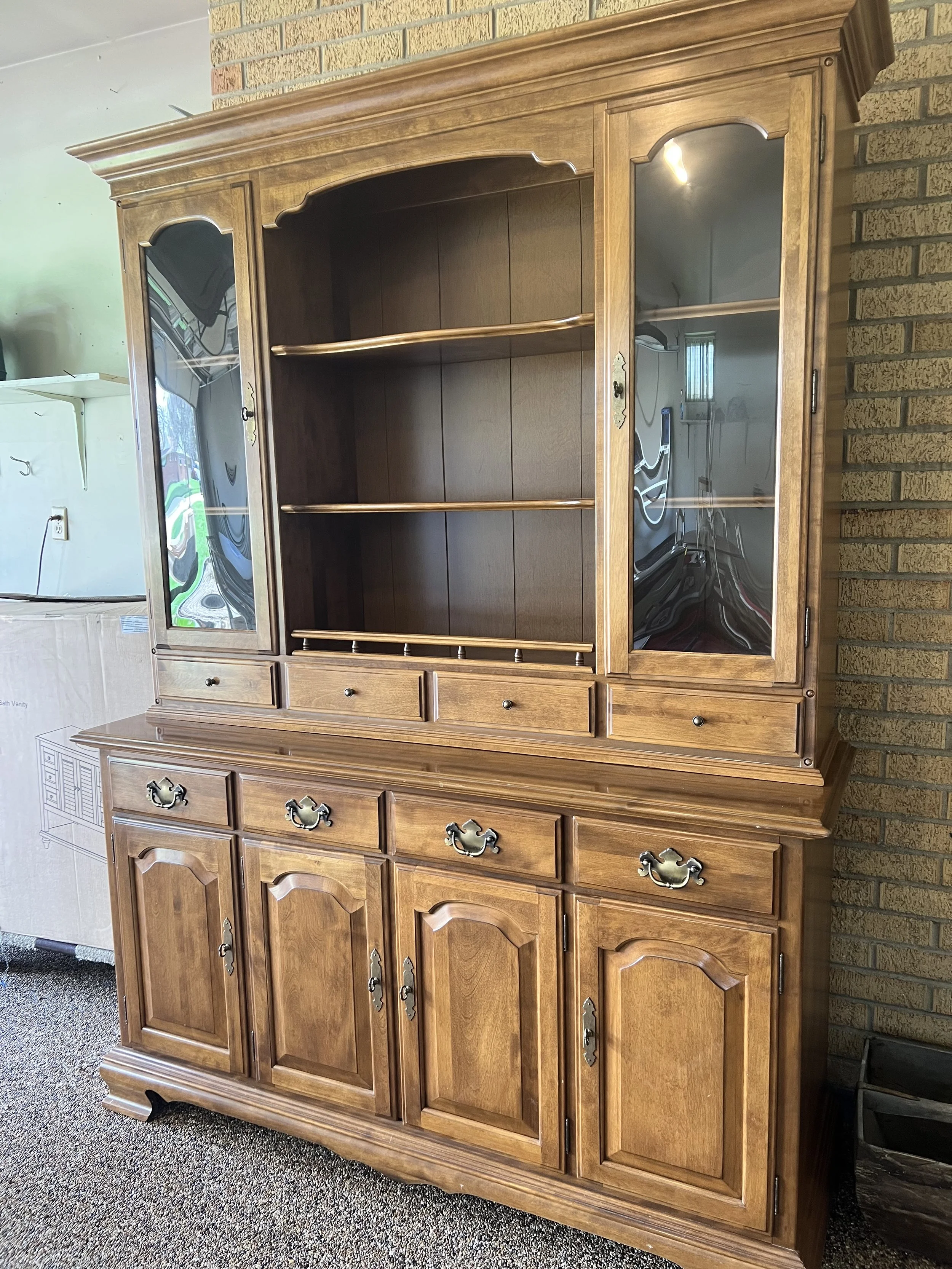 Large, stately lighted solid wood china hutch with glass display doors