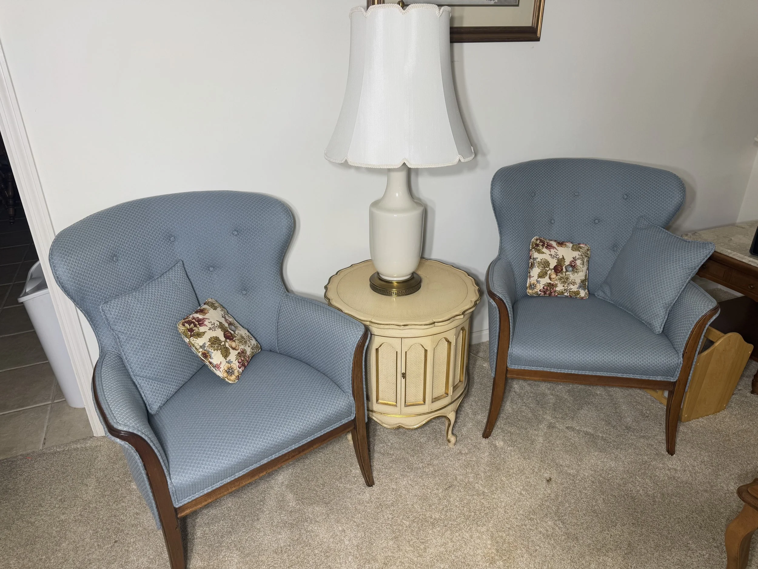 vintage wood-frame wingback chairs