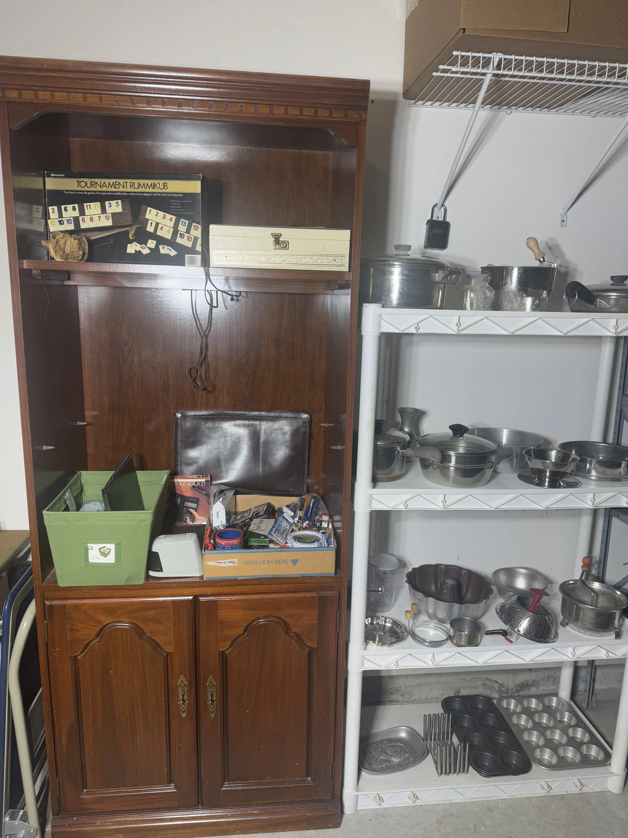 lighted bookshelf and various kitchen items