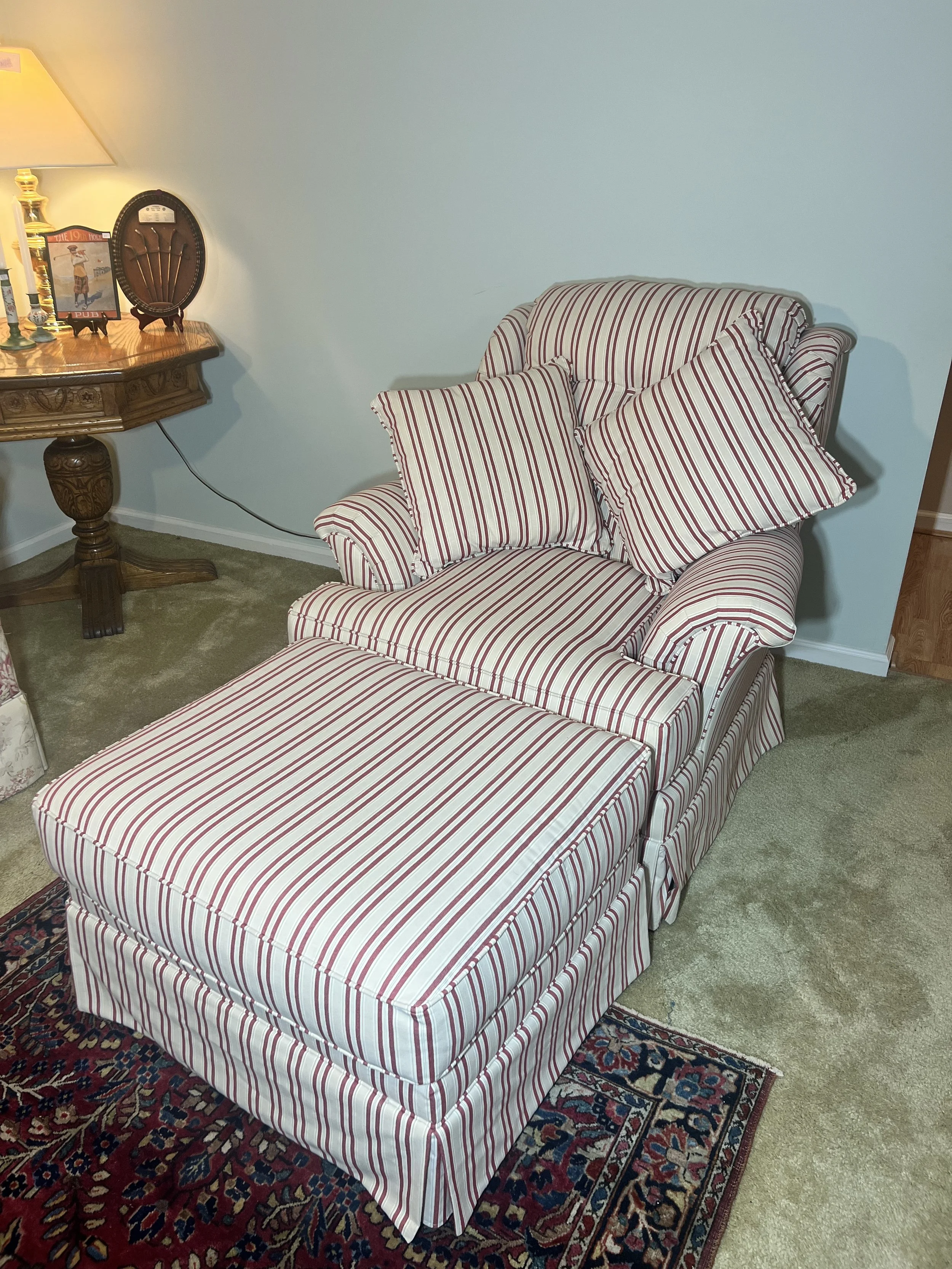 Upholstered Seating: Red/white ticking-stripe armchair with matching ottoman