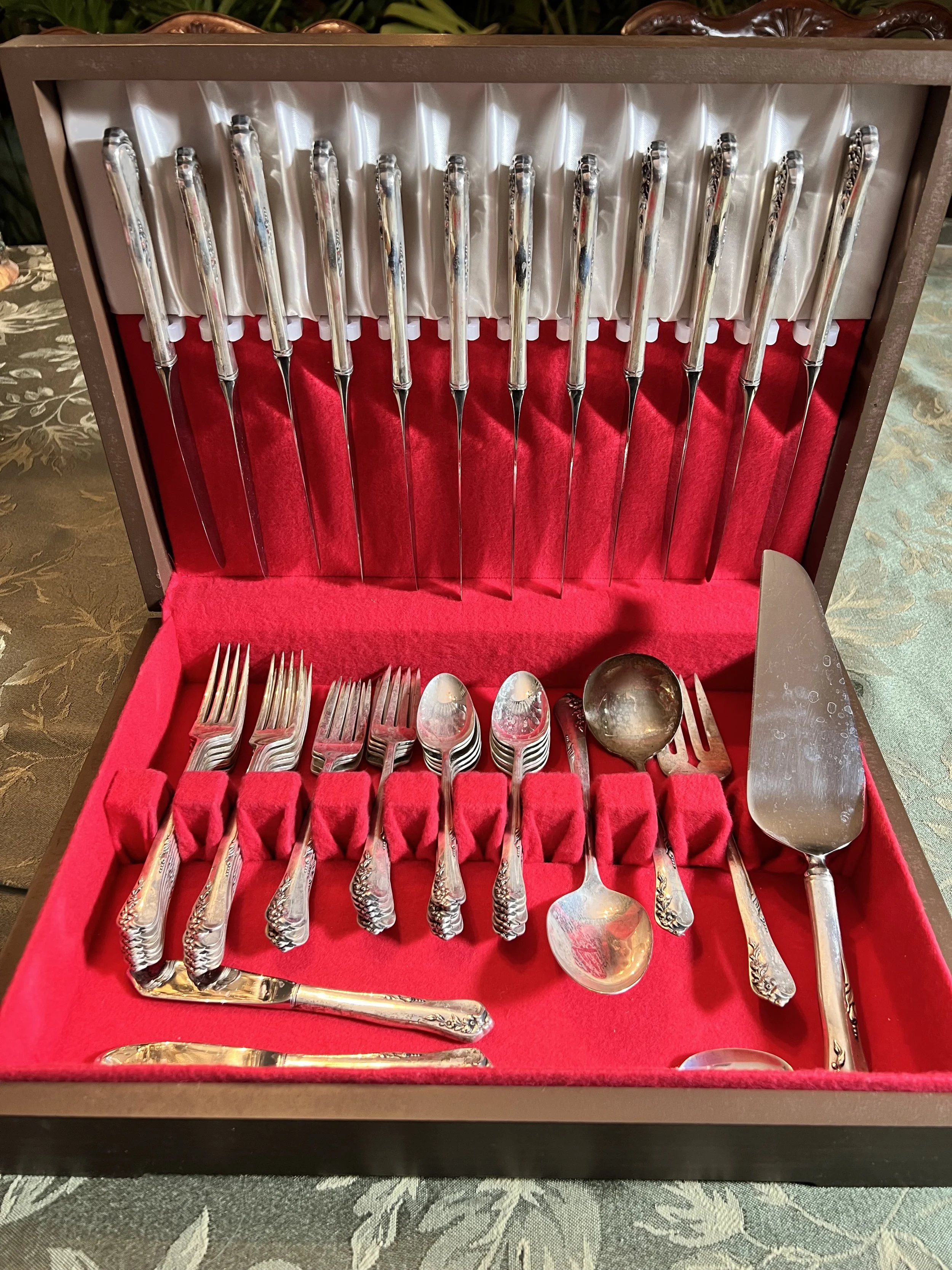 Sterling flatware in wooden box