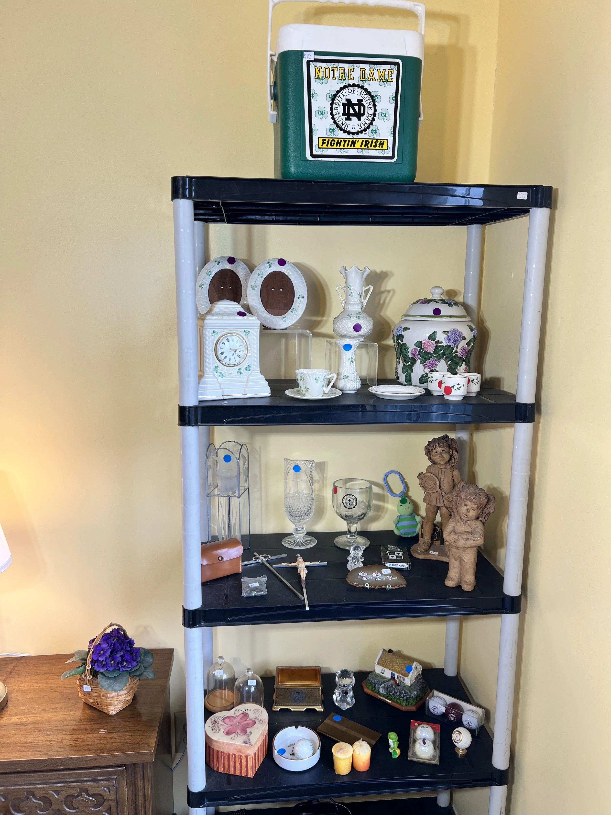 Vintage Notre Dame cooler, shamrock-patterned porcelain clock and vases, and local collectibles