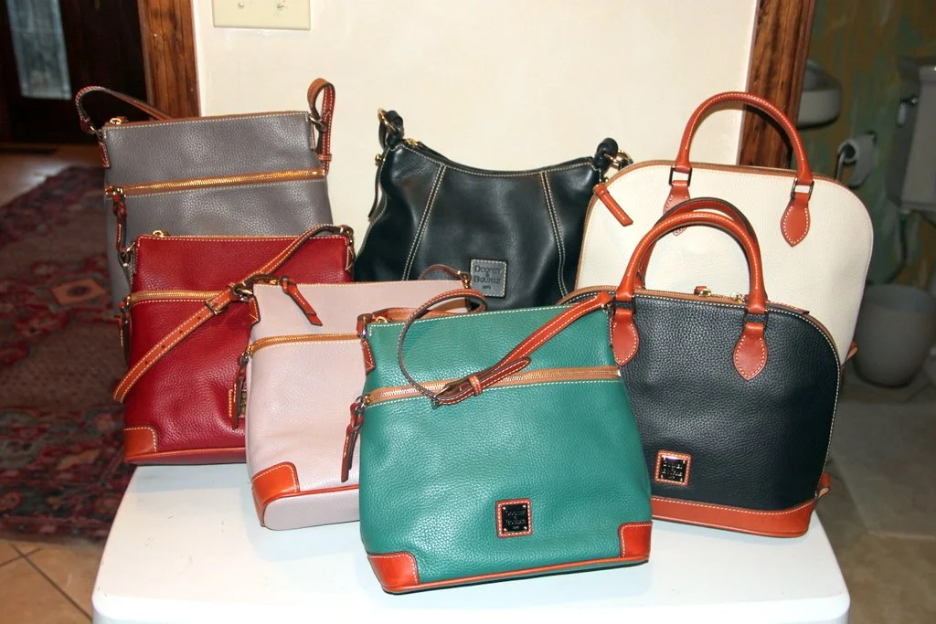  7 - Dooney & Bourke Handbags in Like New Condition with Storage Bags