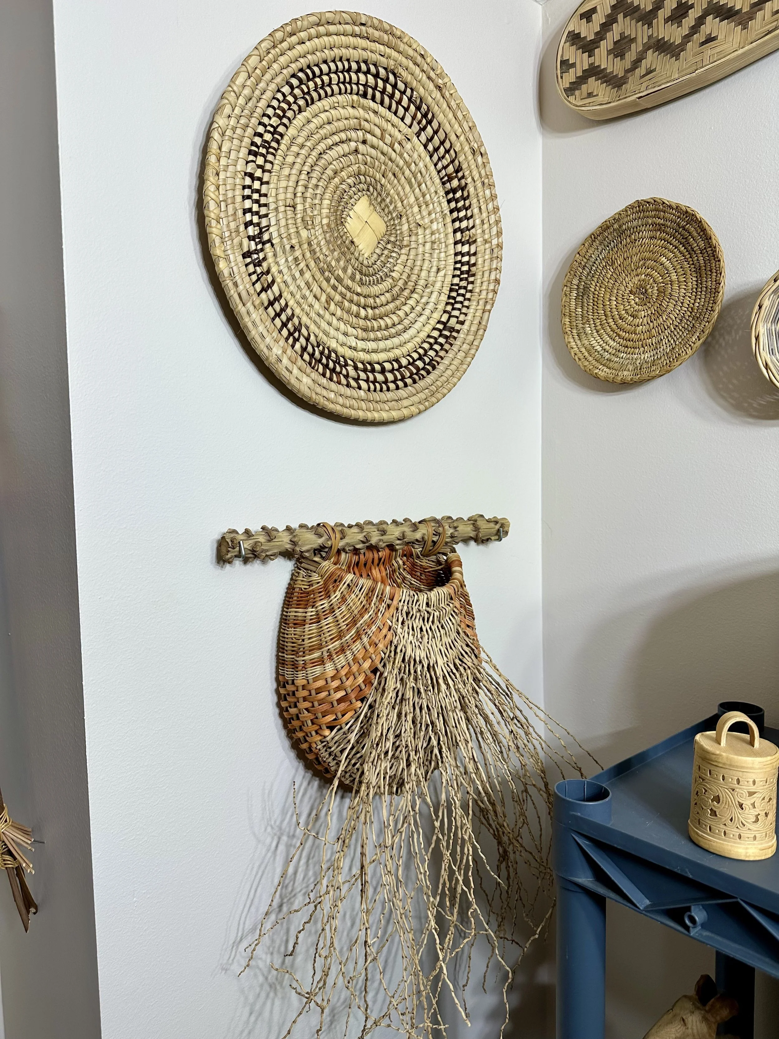 Various decorative baskets and art
