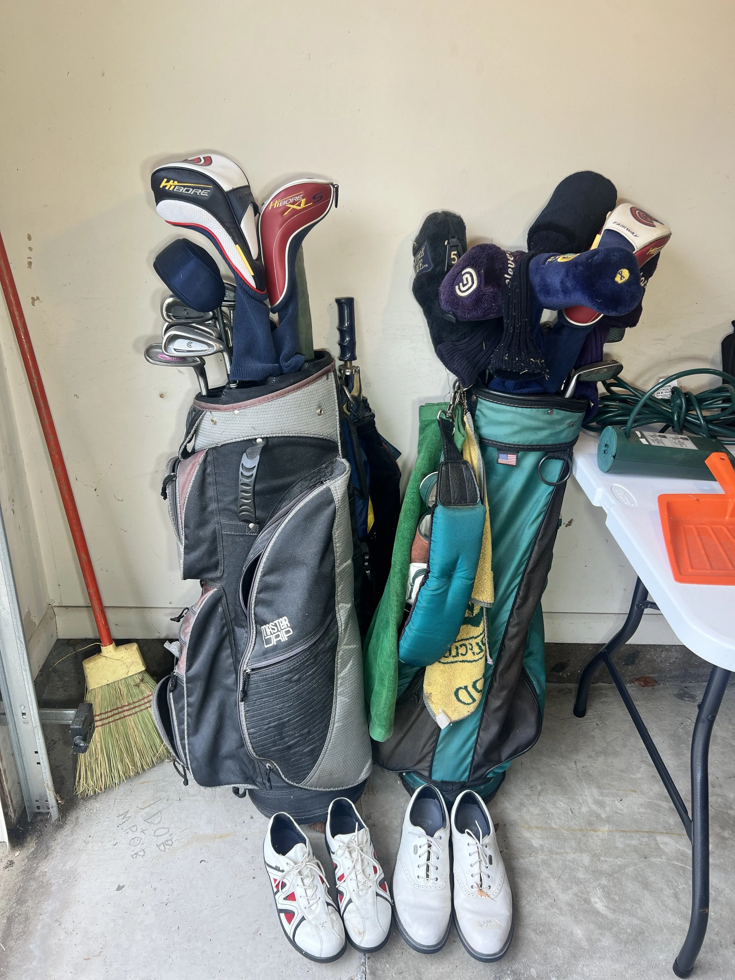 Golf: Two sets of clubs in bags (Master Grip and Cleveland)