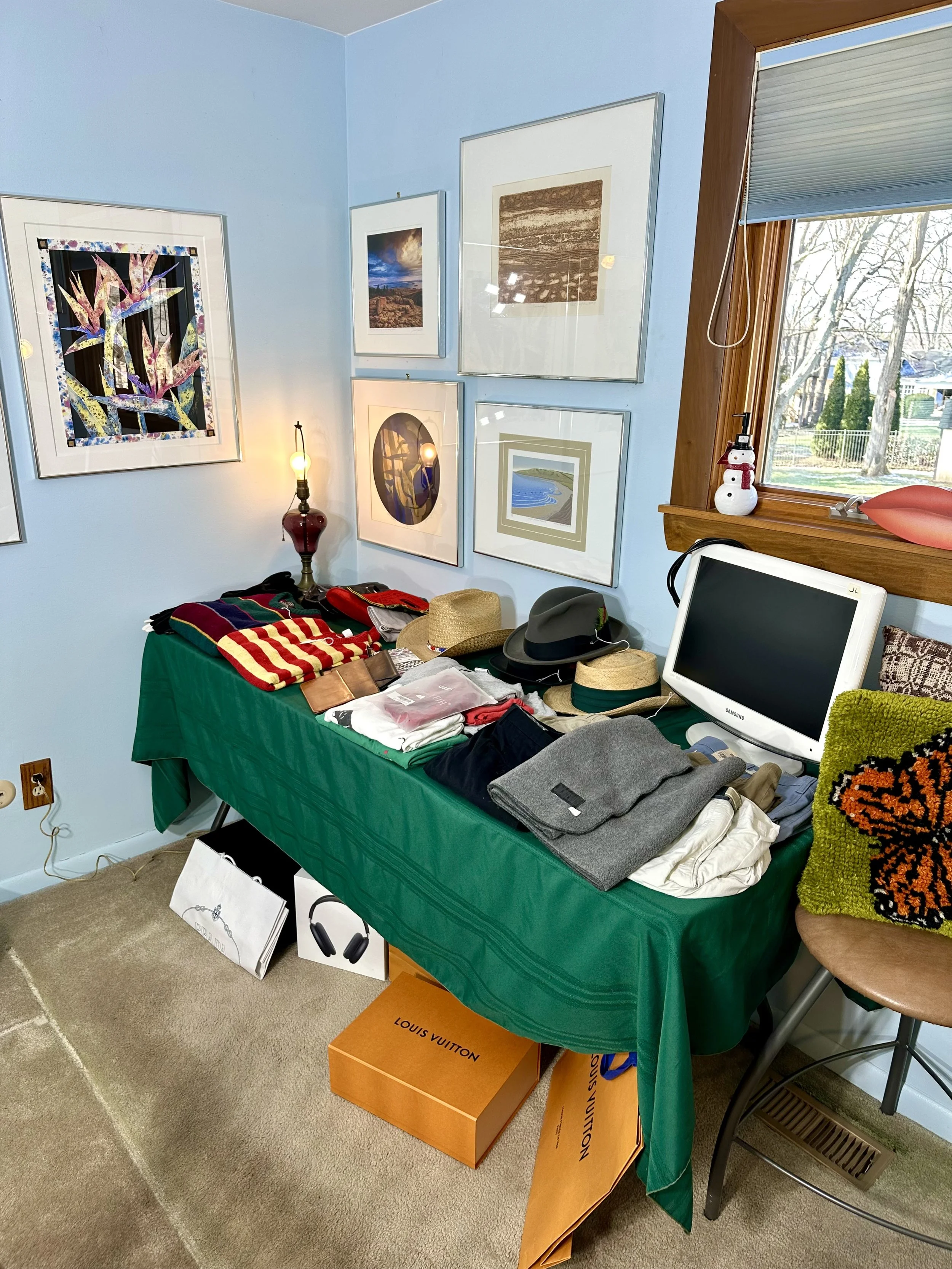 clothing and framed art