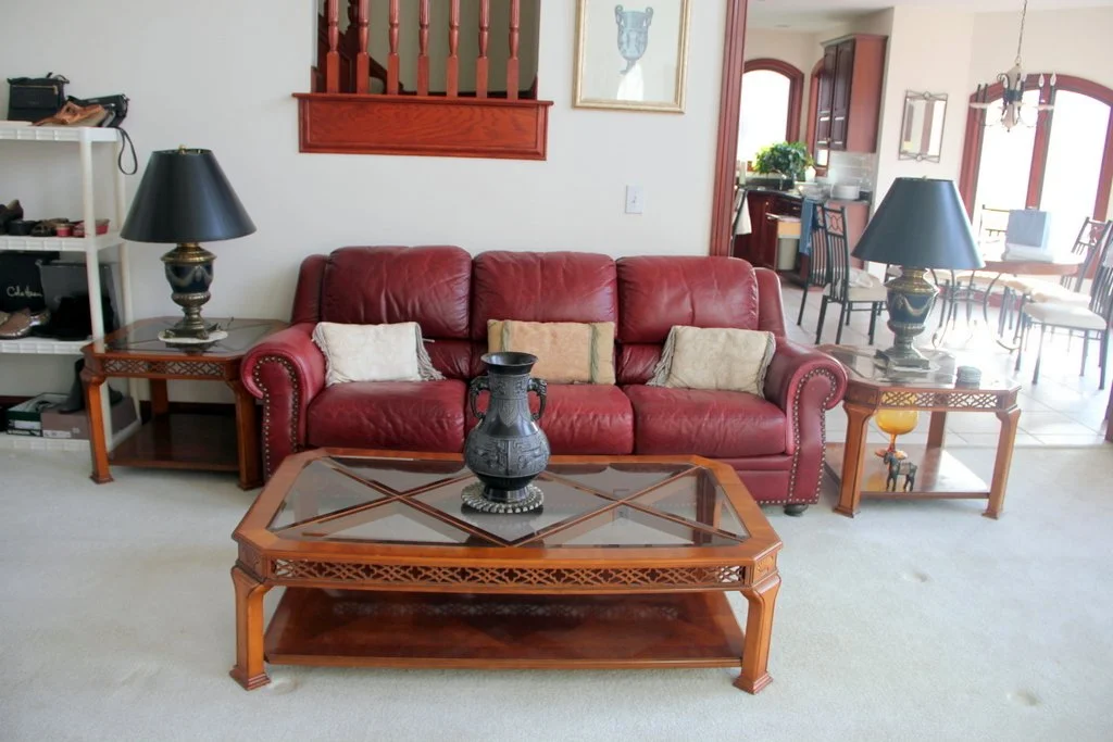 1 0f 2 -Natuzzi Burgandy Leather Sofas, Broyhill Coffee table & Matching End Tabls